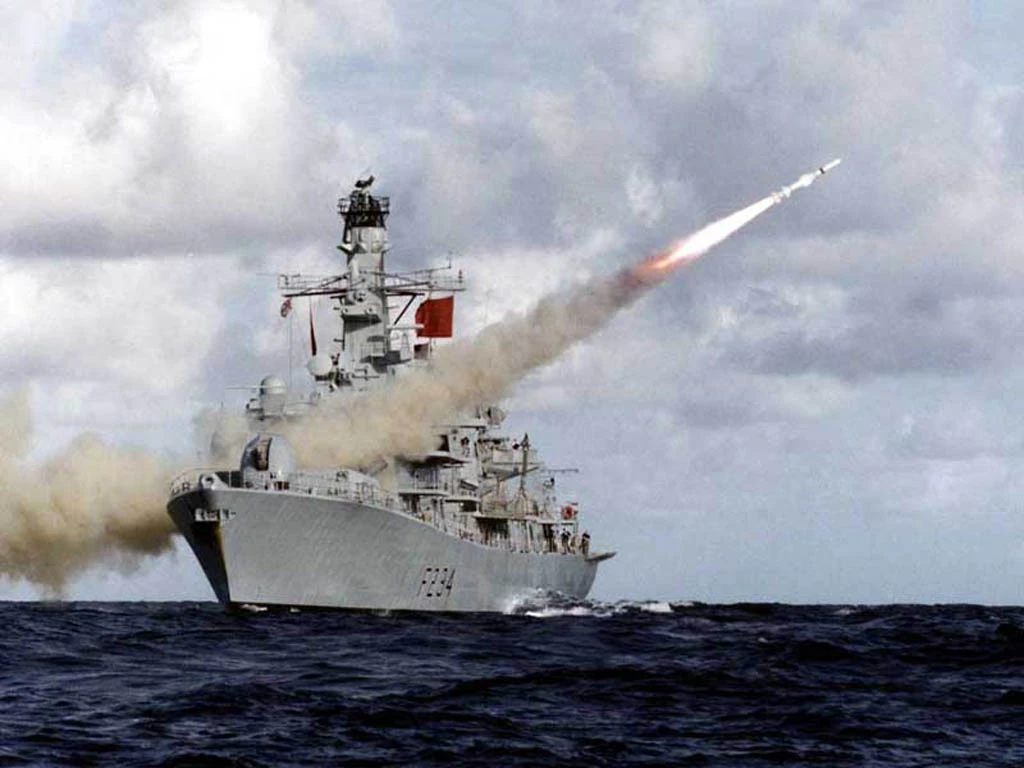HMS Iron Duke firing a missile