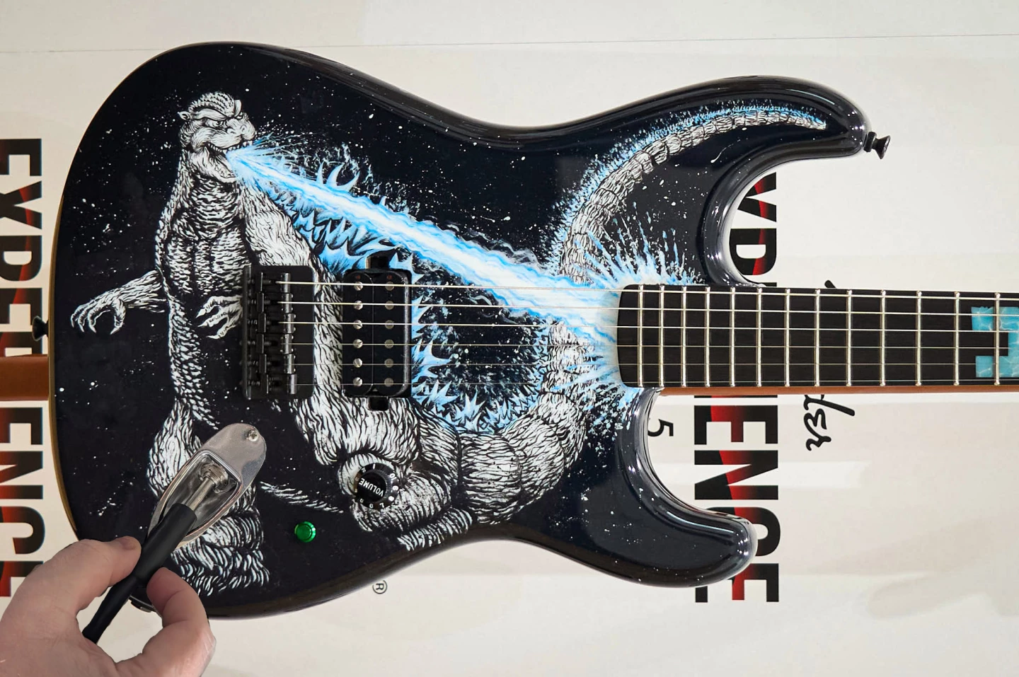 Fender says jack off, we say jack on! Using the magic of Photoshop, we have moved the Strat jack back to its rightful place, and I think all of us (including Godzilla) can agree this was a missed opportunity