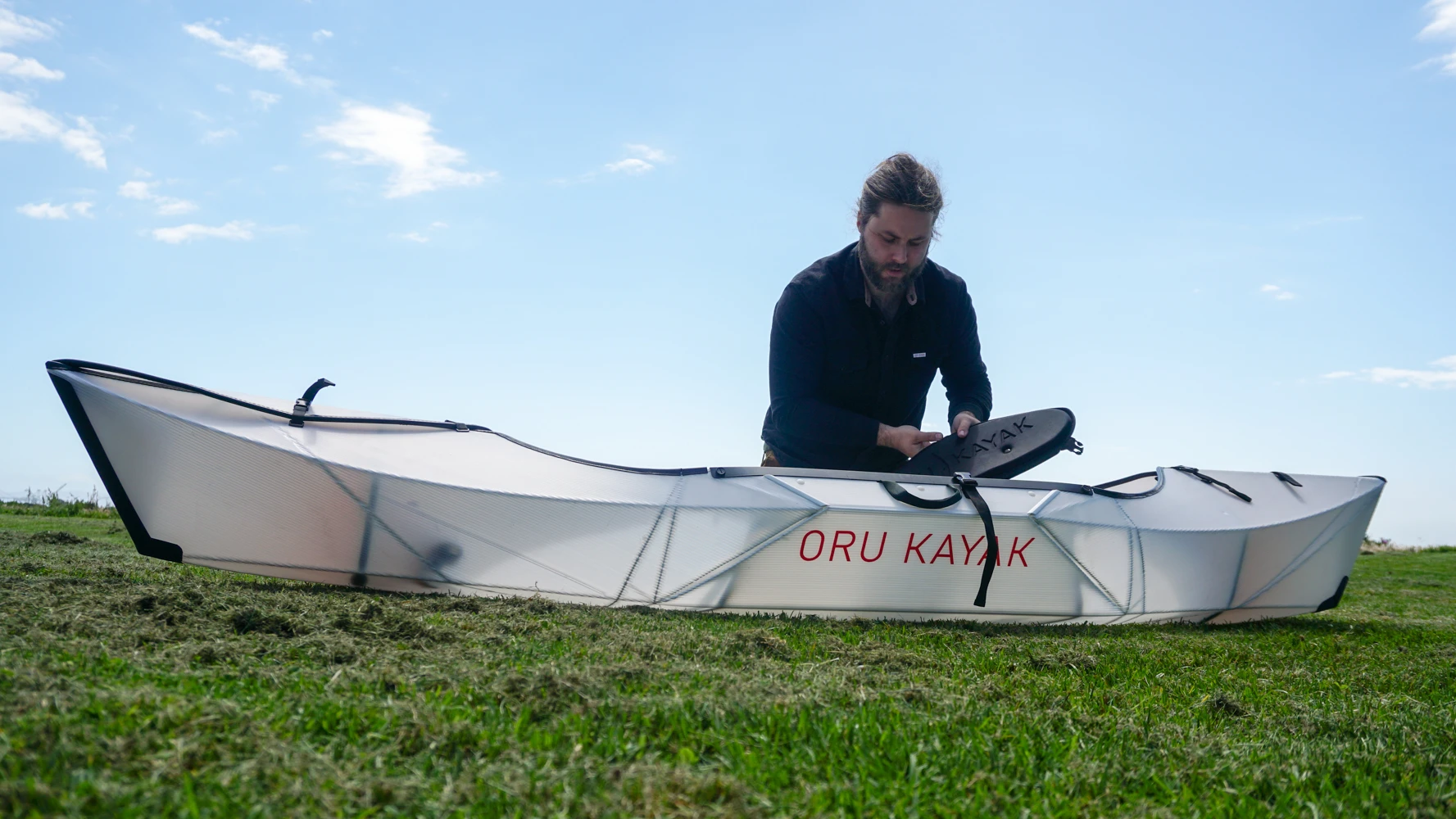 Putting the seat into the Inlet kayak