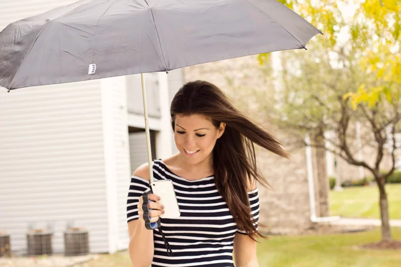 Brolly is an umbrella which sports an innovative finger grip, allowing its user to stay dry and text at the same time