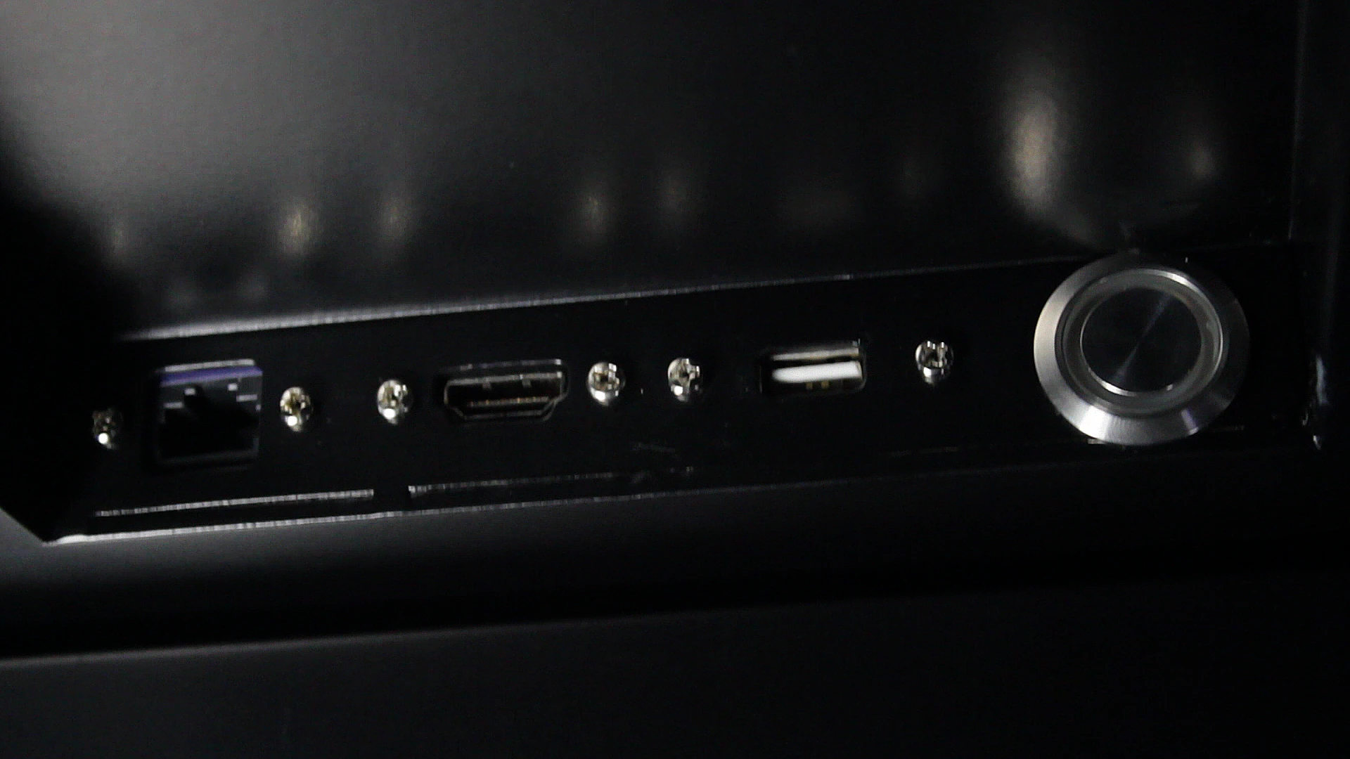 The connectivity ports are hidden from view and the unit's power switch can be locked away