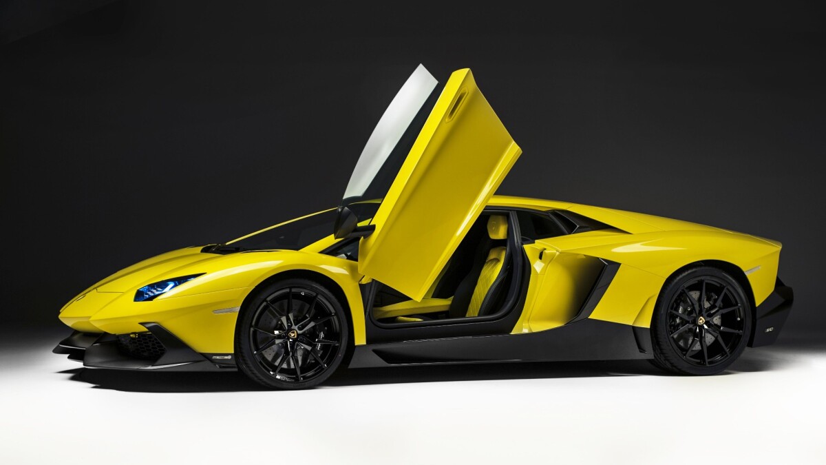 Number #45 of 100, this 50th Anniversary Limited Edition Lamborghini Aventador, sold for $900,000 at the 2014 Naples Winter Wine Festival. The car sold with access to the inaugural US event for the Lamborghini Experienza program. Only 20 of these rare cars were available in the United States.