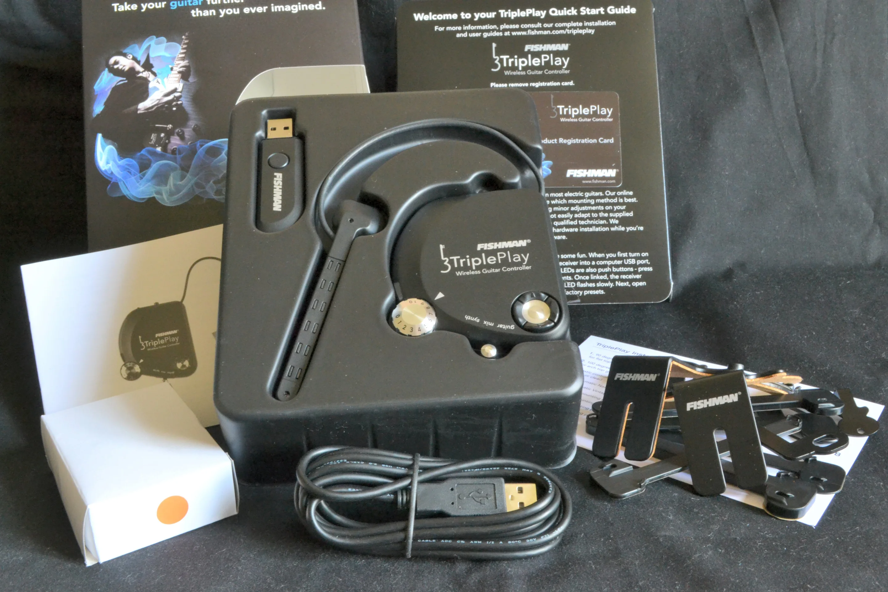 The TriplePlay box contents include the controller and pickup, wireless USB dongle, mounting brackets and pads below (Photo: Paul Ridden/Gizmag)