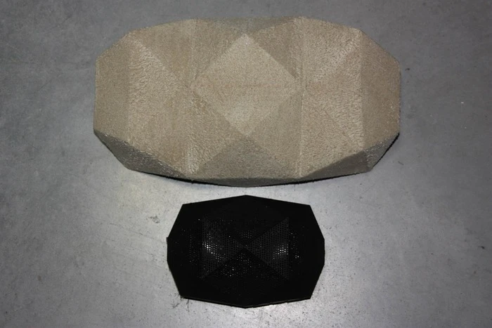 A mock-up of the BIG Turtle Shell next to the original