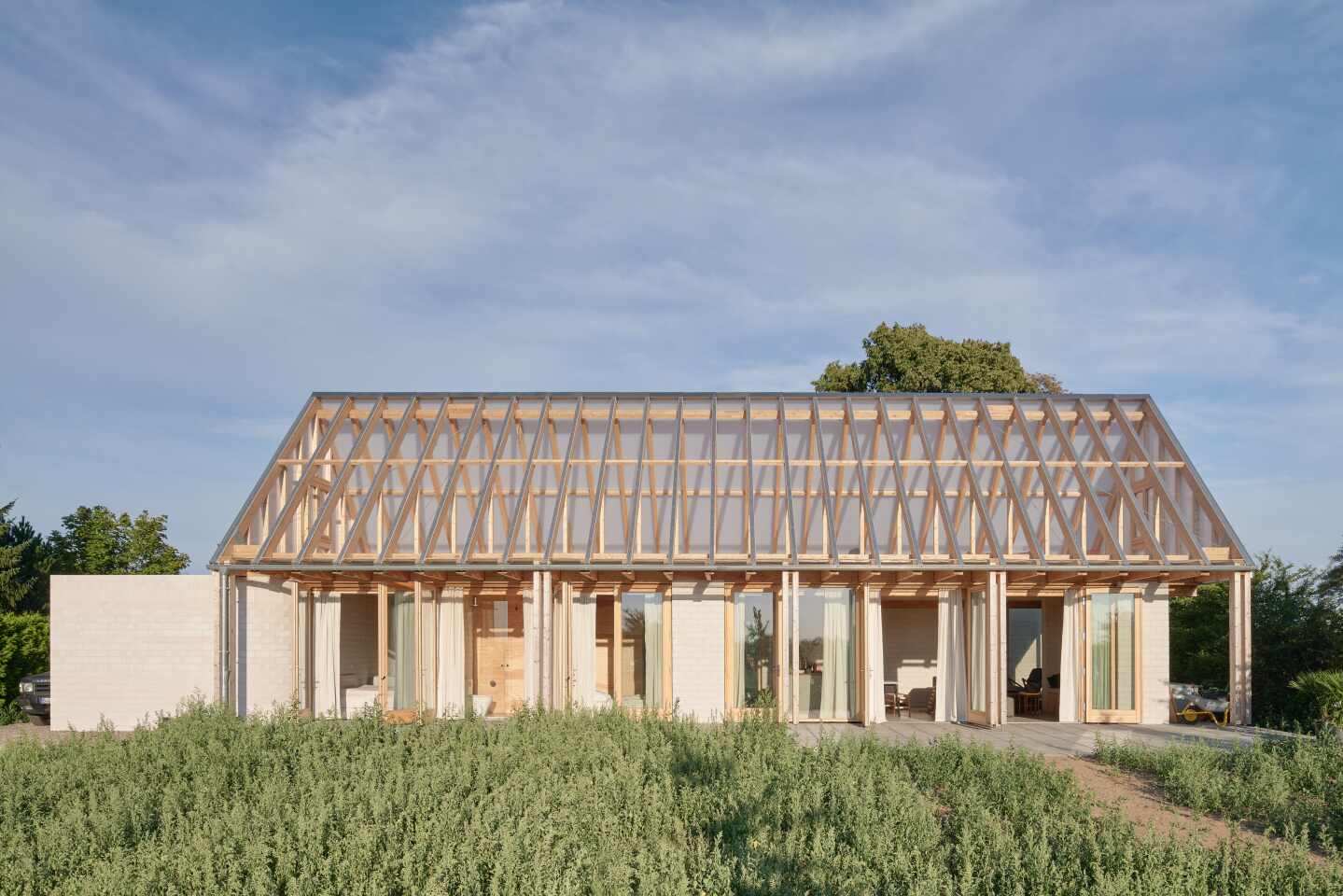 Not your average glass house: Das Glashaus features a brick first floor and a transparent roof
