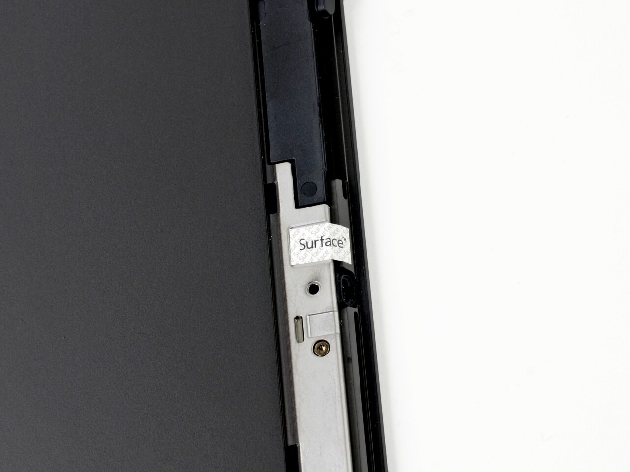 The Surface teardown revealed a tamper-evident label that breaks apart upon removal (Photo: iFixit)