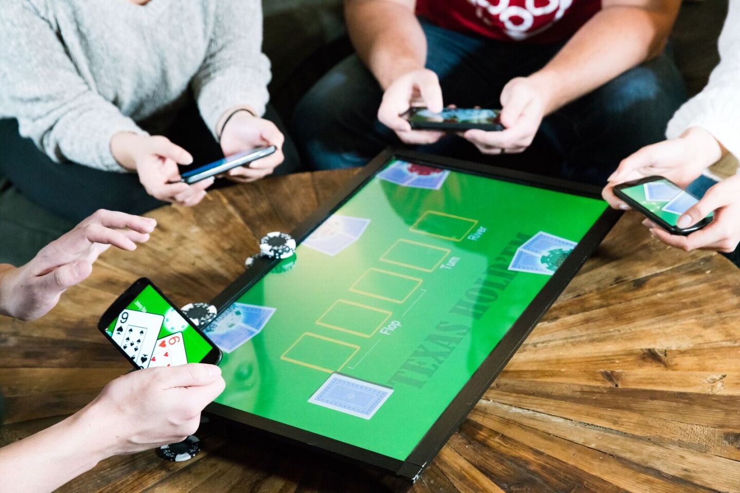 By syncing phones to the PlayTable, users can have their own private screen to display things like the cards in their hand