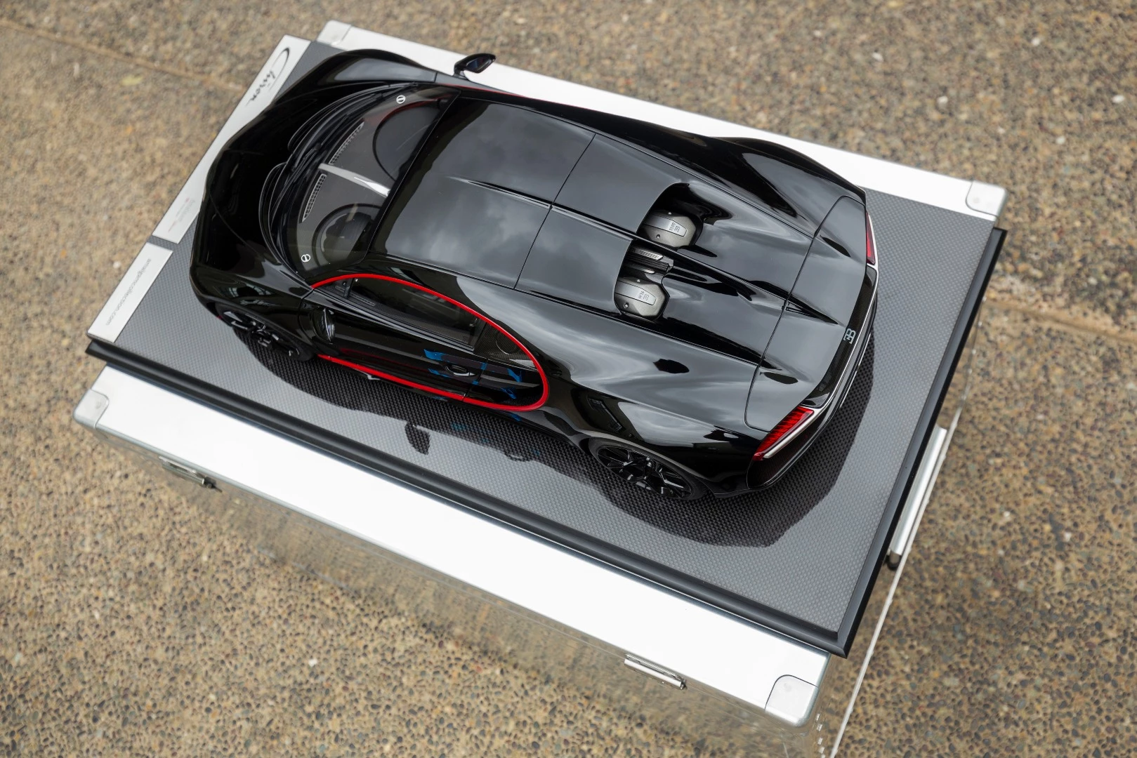 The first Chiron to reach auction was a black with red highlight Chiron sold by RM-Sothebys at its New York Icons sale last December (2017), which fetched $3,772,500.
