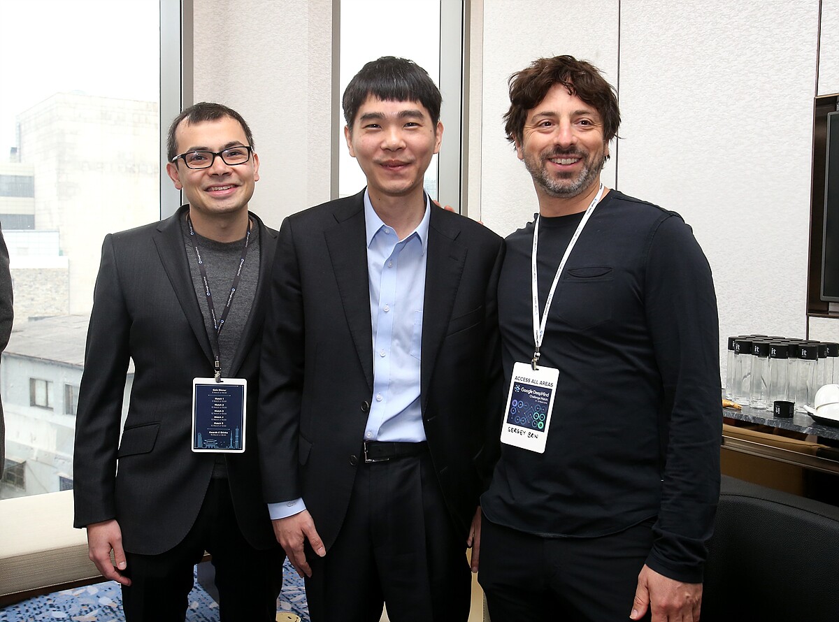 Lee Sedol (center) with Google co-founder Sergey Brin (right) and DeepMind founder Demis Hassabis (left)