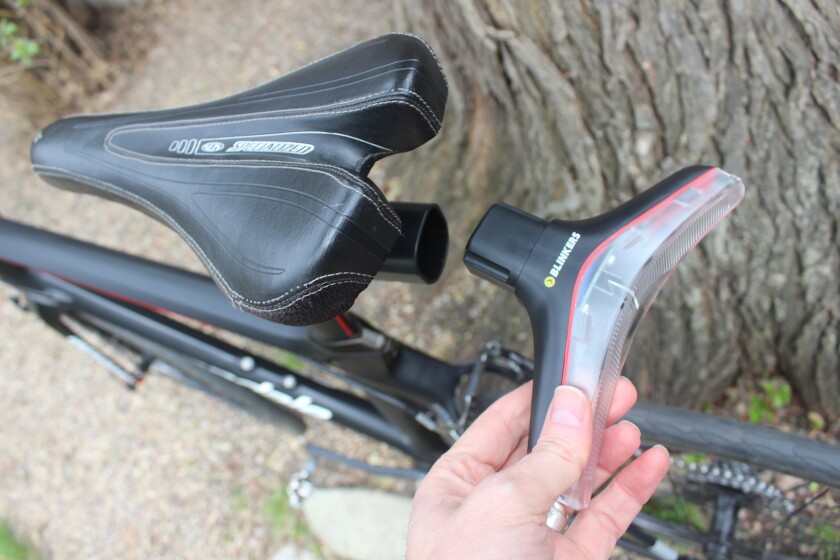 The Blinkers lights quickly and easily pop in and out of magnetized brackets mounted on the handlebars and saddle rails