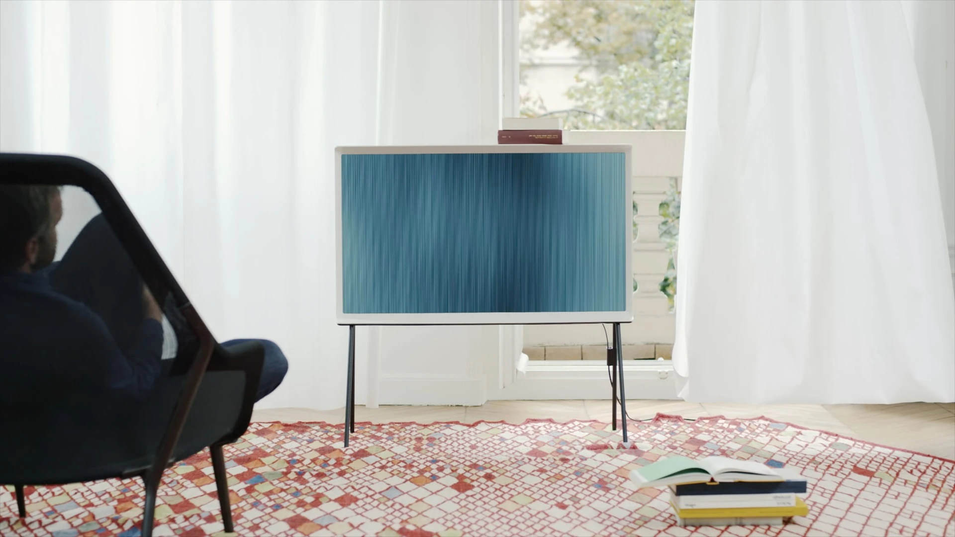 The TV can also be mounted on four legs