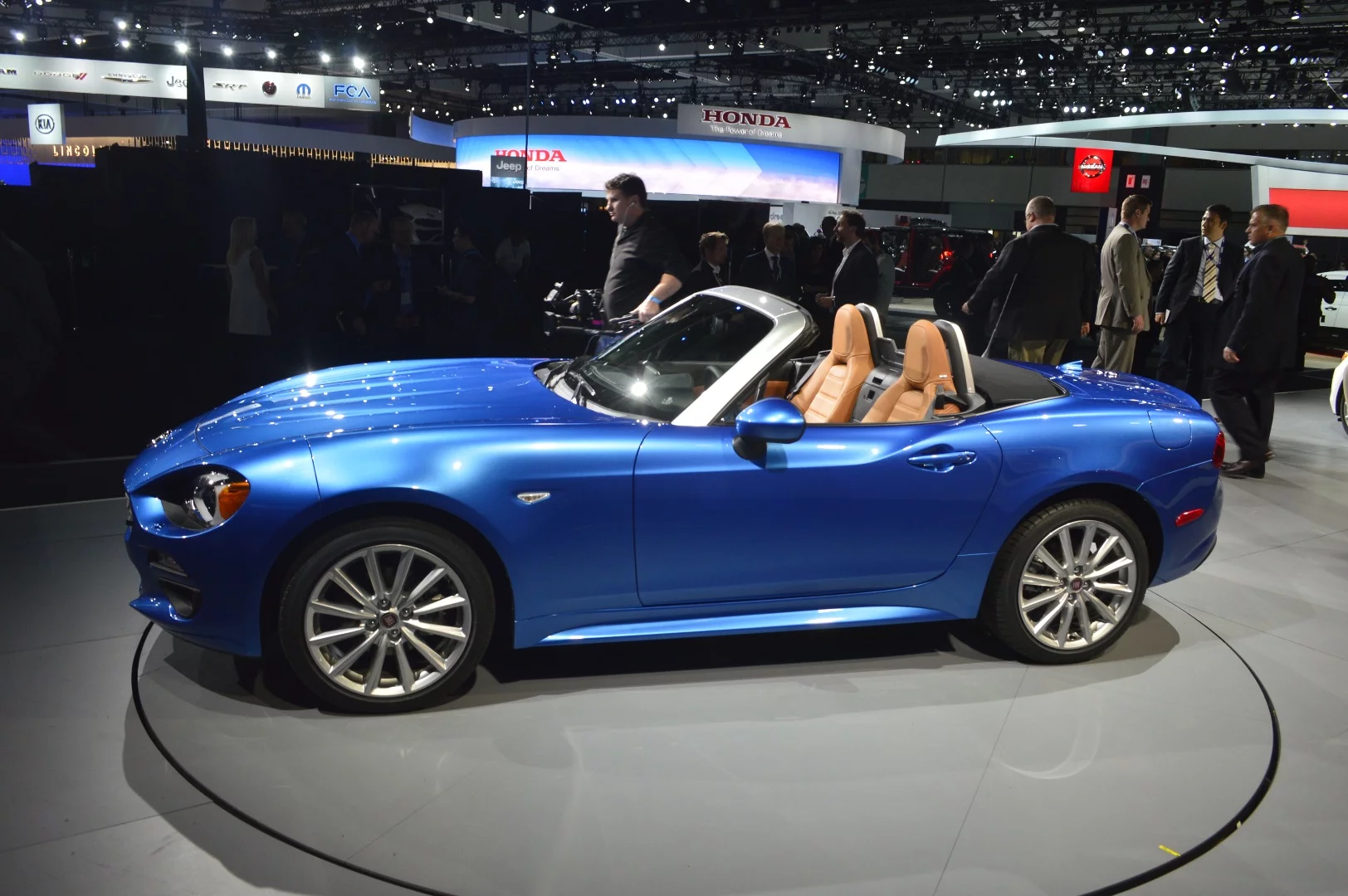 Hints of the 1960's 124 are found in the front fascia, hood work, and the badge on the deck lid