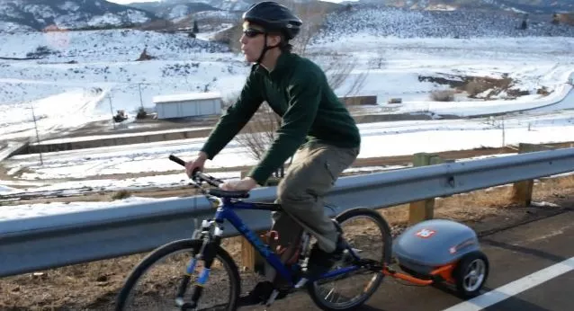 The Ridekick is a motorized bicycle trailer, that gives a power boost to standard non-motorized bicycles