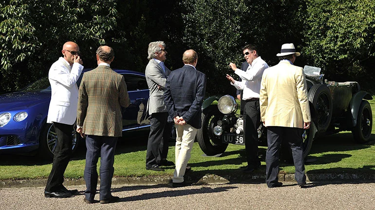 Some British chaps talking about cars
