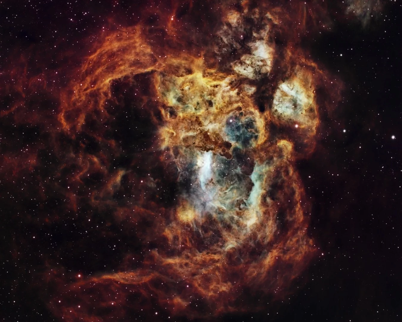 The NGC 6357, commonly known as the Lobster Nebula, spans about 400 light years and lies about 8,000 light years away from the Earth, toward the constellation of the Scorpion. Due to the nature of light collected, colours in this image are arbitrary, with hot hydrogen shown in red, and oxygen and sulphur in blue and green respectively. However, extreme care was taken to preserve the faintest structures and intricacies within the nebulosity when stitching the data together. Data for this narrowband image was acquired over three nights in June 2018 from the photographer’s small backyard in the tropical North Queensland. Proserpine, Queensland, Australia, 1–2 & 4–6 June 2018