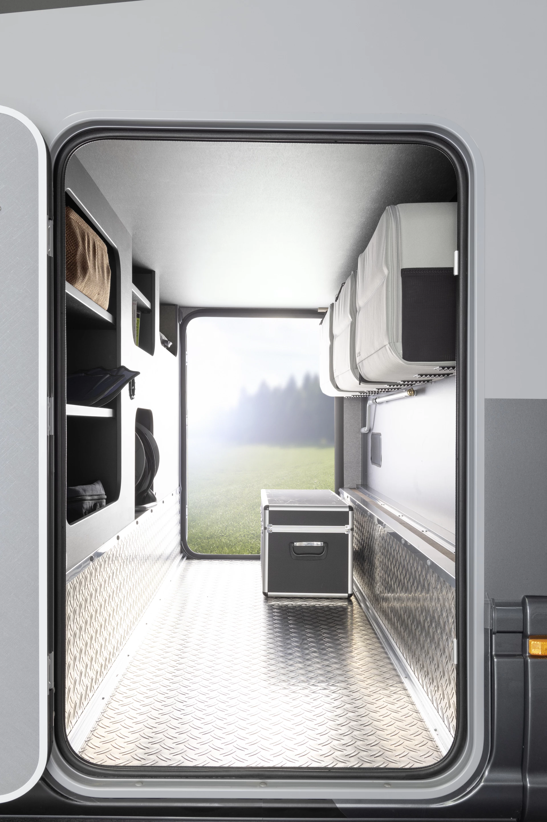 Down below the rear beds, the Globebus Performance 4x4 has a large pass-through storage garage
