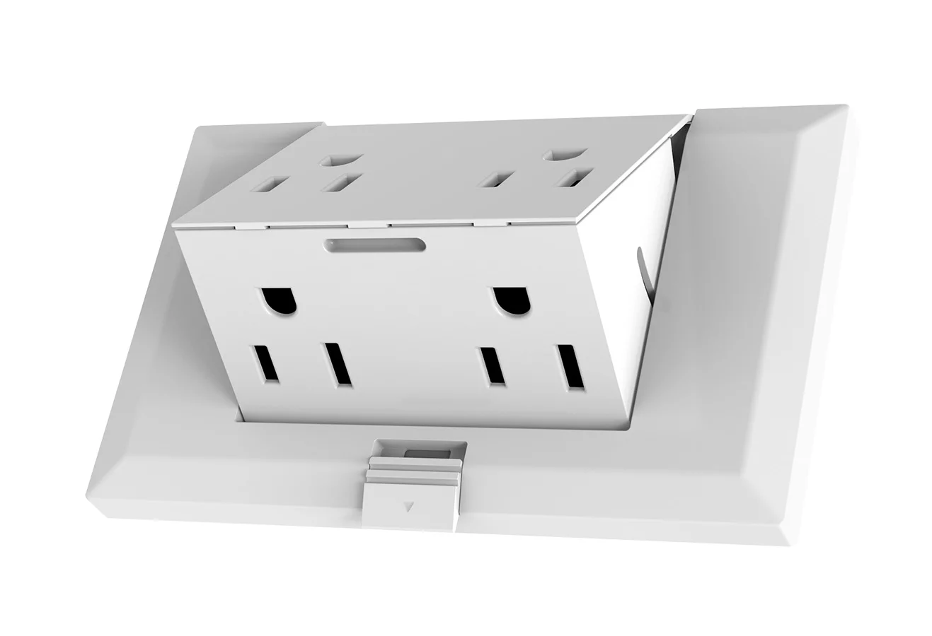 A button on theOUTlet allows the central unit to "pop out" from the rest of the fitting, providing two additional sockets