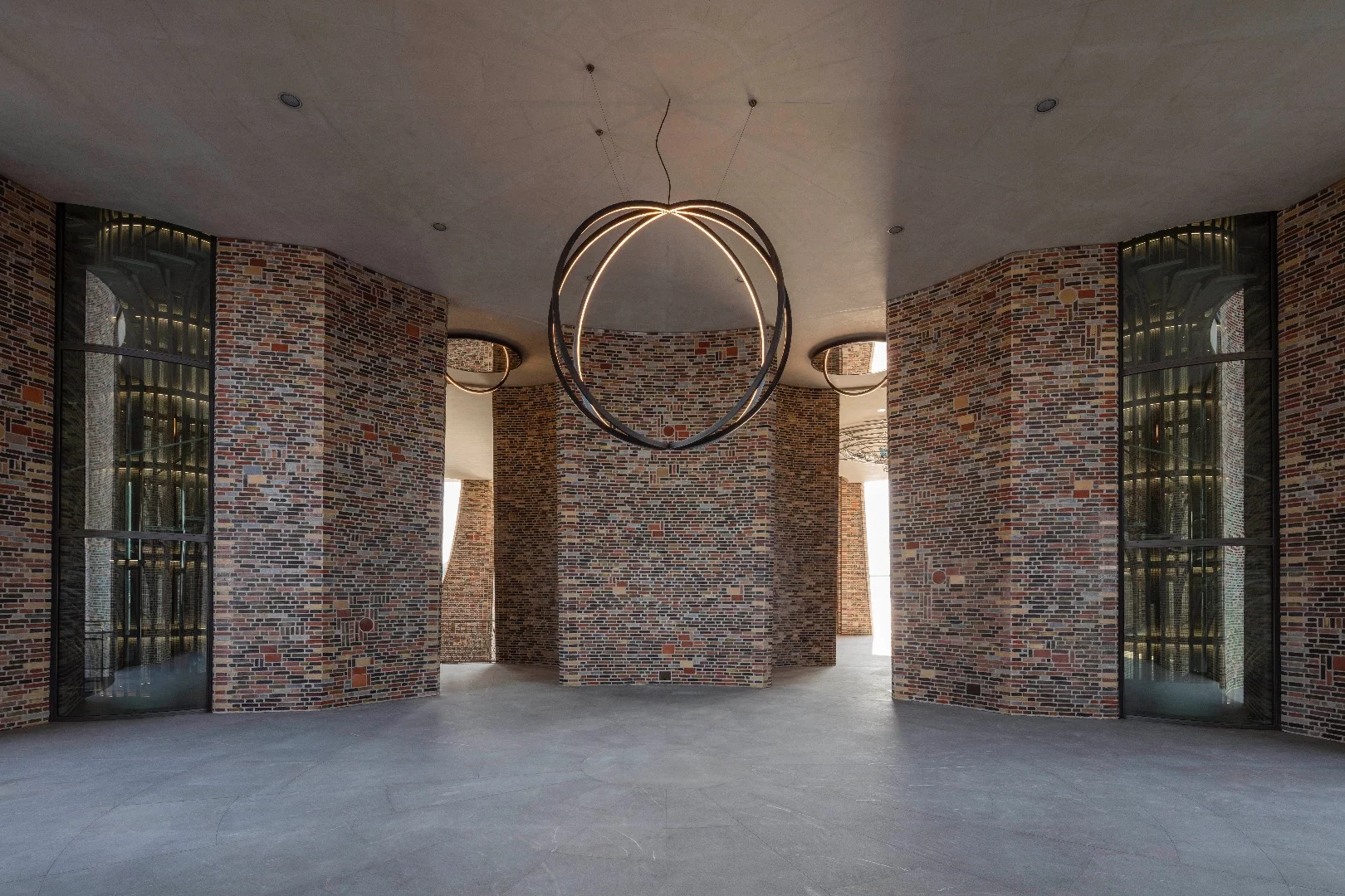 Visitors are greeted by a public double-height entrance and artworks by Eliasson