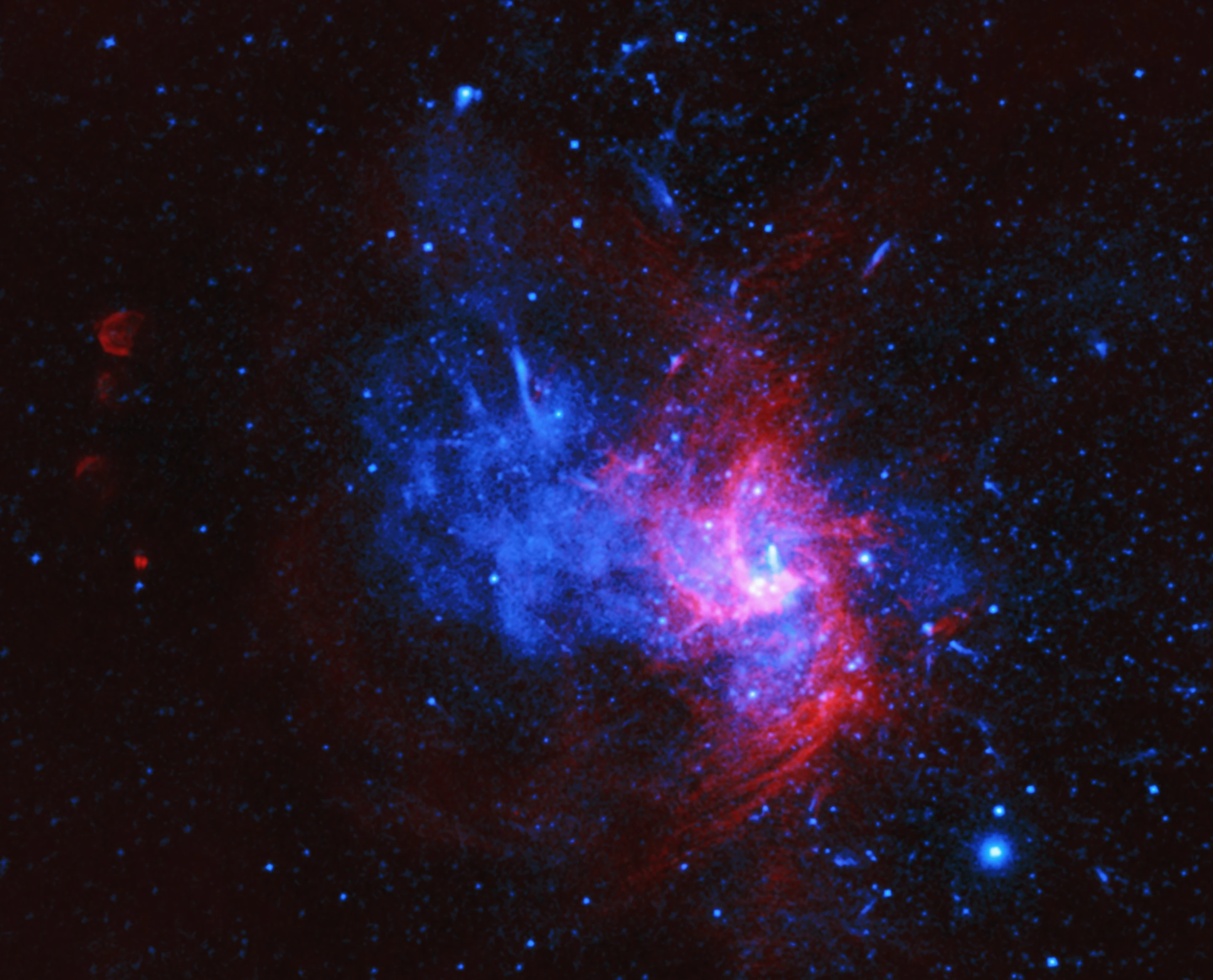 The bright spot on the right of the image is Sagittarius A*, the supermassive black hole at the center of the Milky Way galaxy