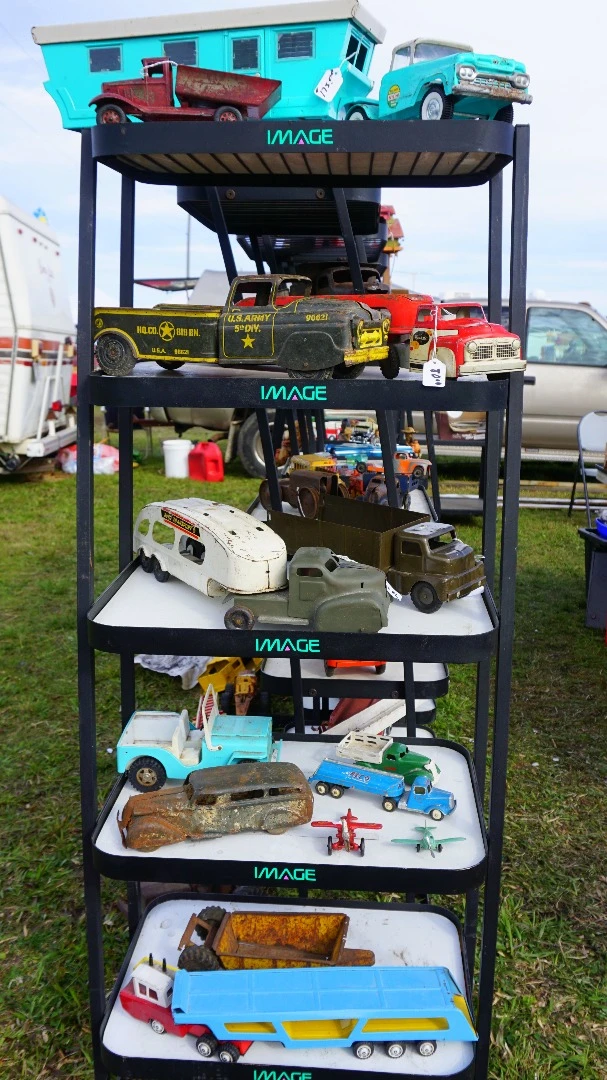 Antique Toys For Big Boys And Girls: A nice selection of 1950's and 60's toys -that house trailer on the top shelf will set you back $175