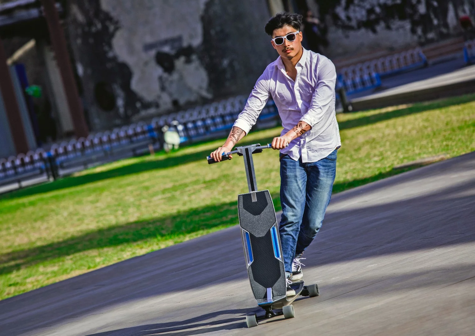 The longboard has folding handlebars that create a scooter