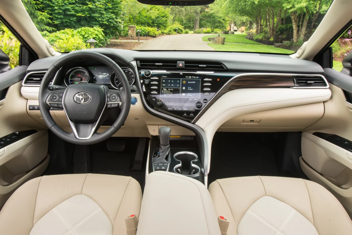 The dashboard sits a little higher, the seating feels a little more firm, and the doors feel a bit wider out than before in the 2018 Camry