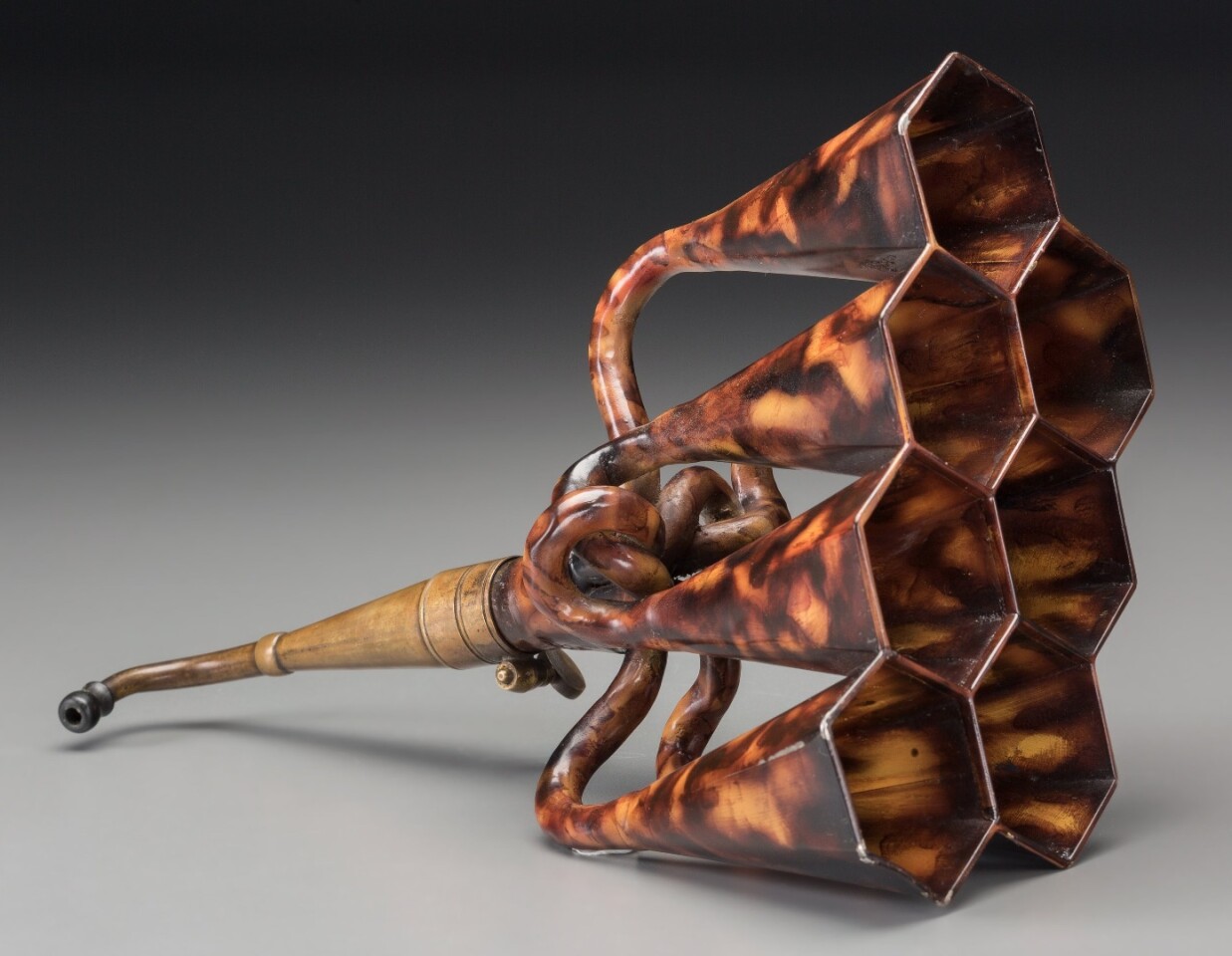 Long before electronic hearing aids and the Cochlear implant, the only hearing aid available was the ear trumpet, which funnels sound waves into the ear. Though conceived some 150 years earlier, ear trumpets were first manufactured in 1800, making this elaborate item with seven trumpet heads, one of the very earliest available. For the hard-of-hearing, ear trumpets quickly became popular with one of the first prominent users being Ludwig Van Beethoven. With an estimate of $1,000 to $1,500, it's an affordable and fascinating triumph of ingenuity, not to mention a wonderful conversation piece.