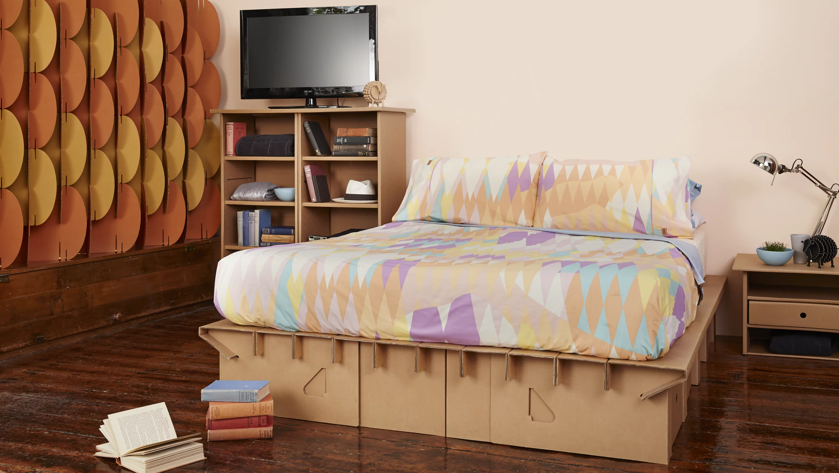 Aside from the Paperpedic Bed, Karton's range include chests of drawers, TV units, room partitions and cardboard animals which can be decorated and painted