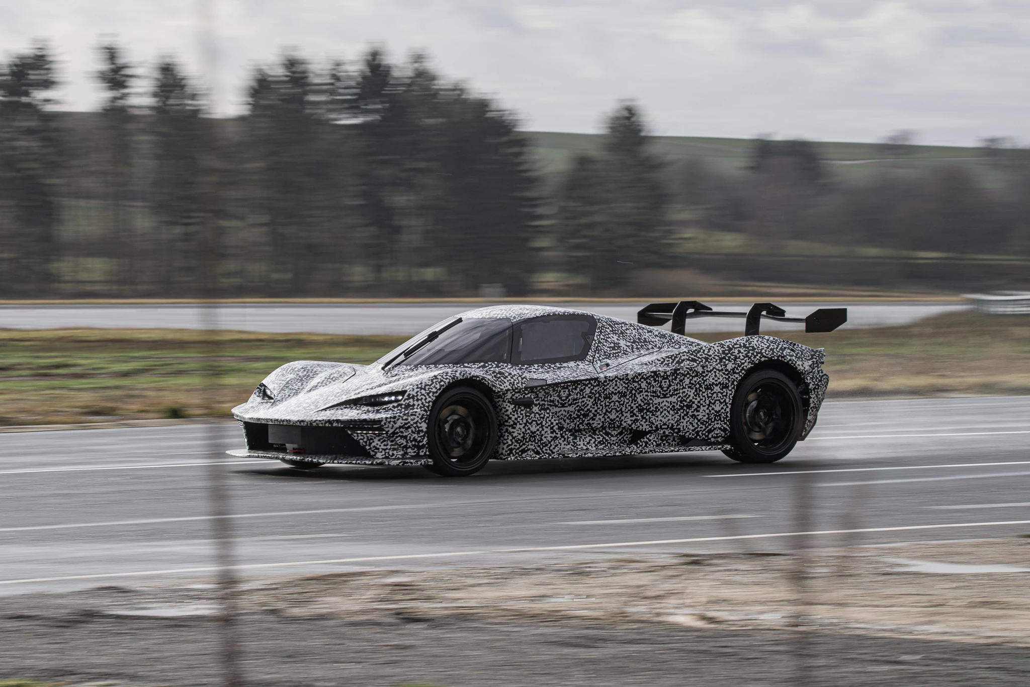 The street car prototypes, although camouflaged, appear to use the same pop-up jet-fighter cockpit from the X-Bow GT2
