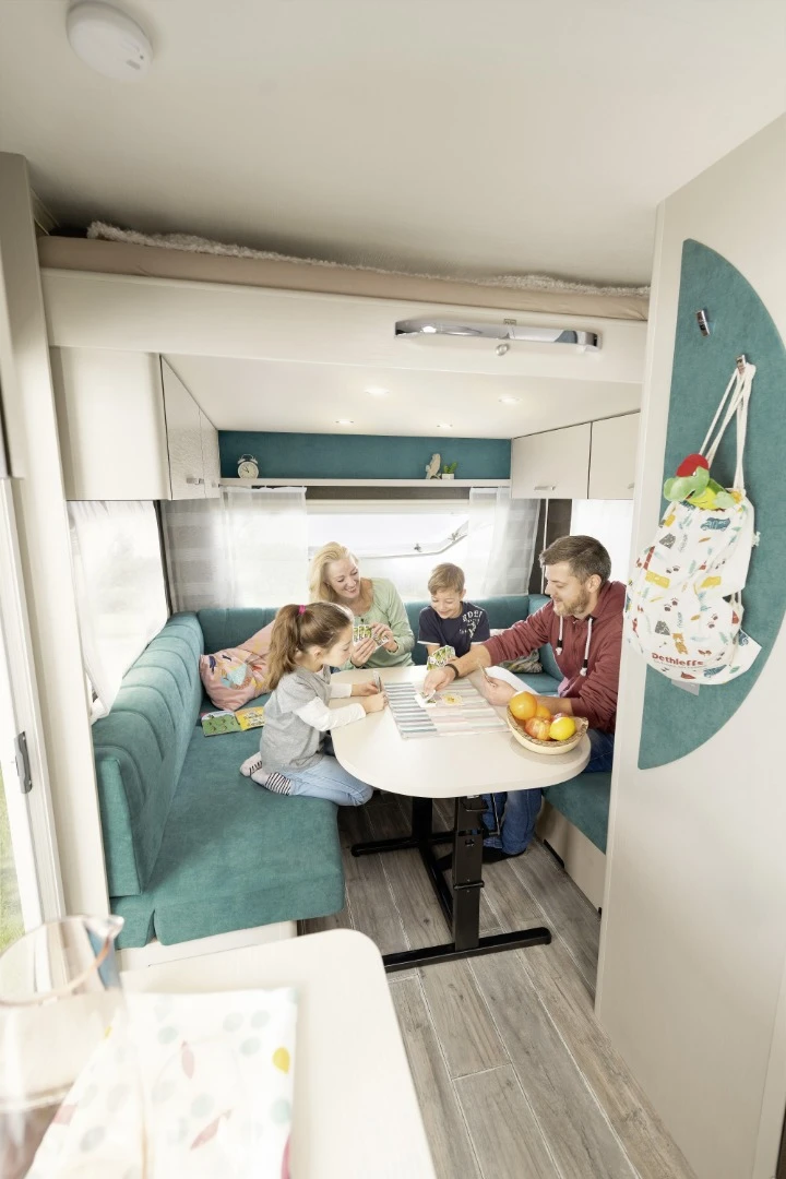 If you're wondering how the bed lowers with the upper cabinets in the way, the cabinets actually lower down with it