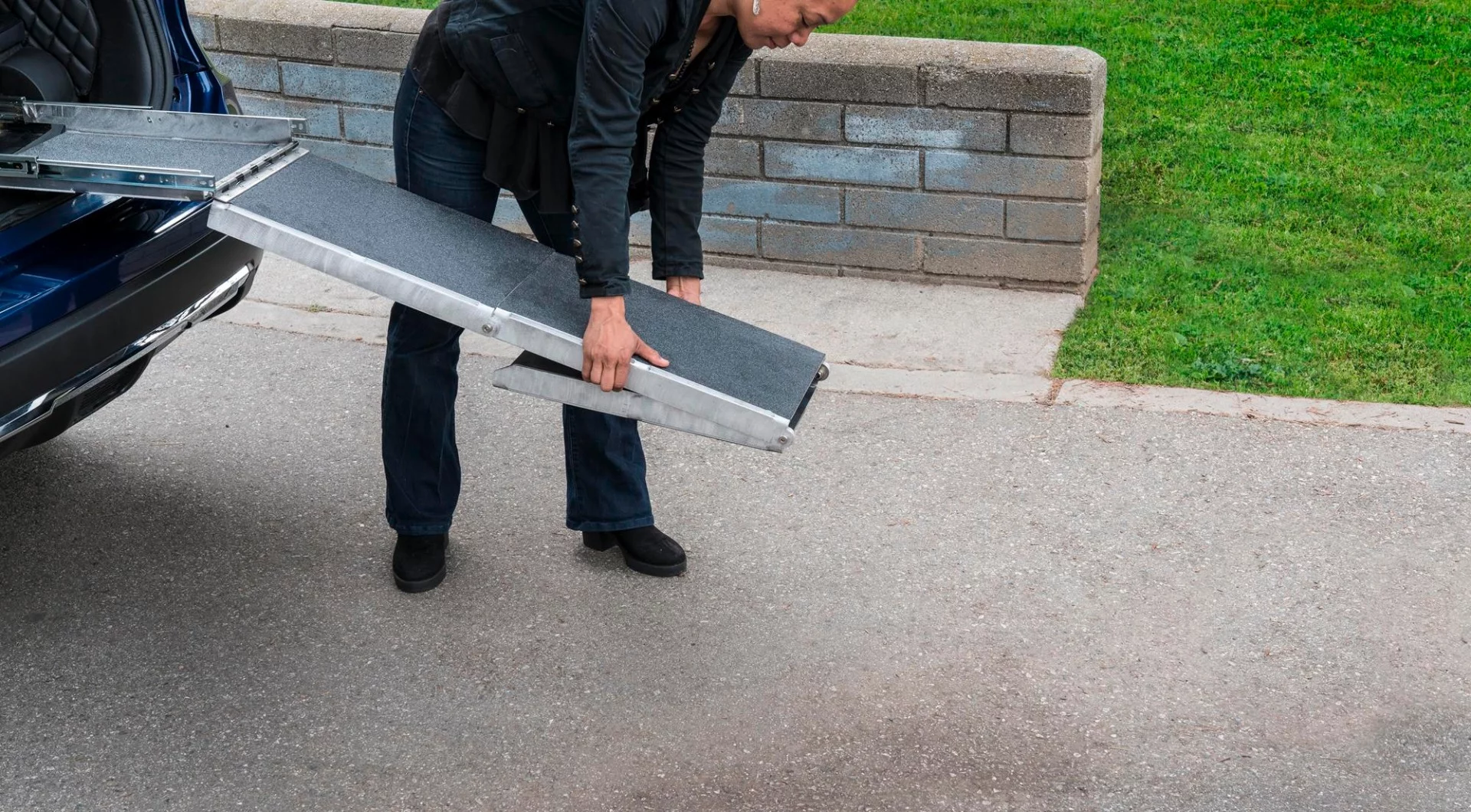 This slide-out, fold-out dog ramp to help Fido get in and out of the Rogue Dogue is a pretty good idea, we think