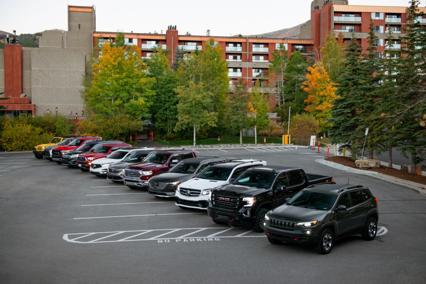 Our lineup of vehicles ready to depart from our hotel to the base camp near Breckenridge, Colorado