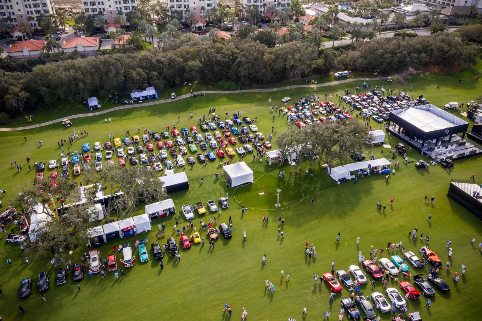 The Amelia Island Concours "Cars & Coffee" event is held on the day prior to the main event and encourages the owners of vintage, exotic, and collectible vehicles to gather on the concours show field