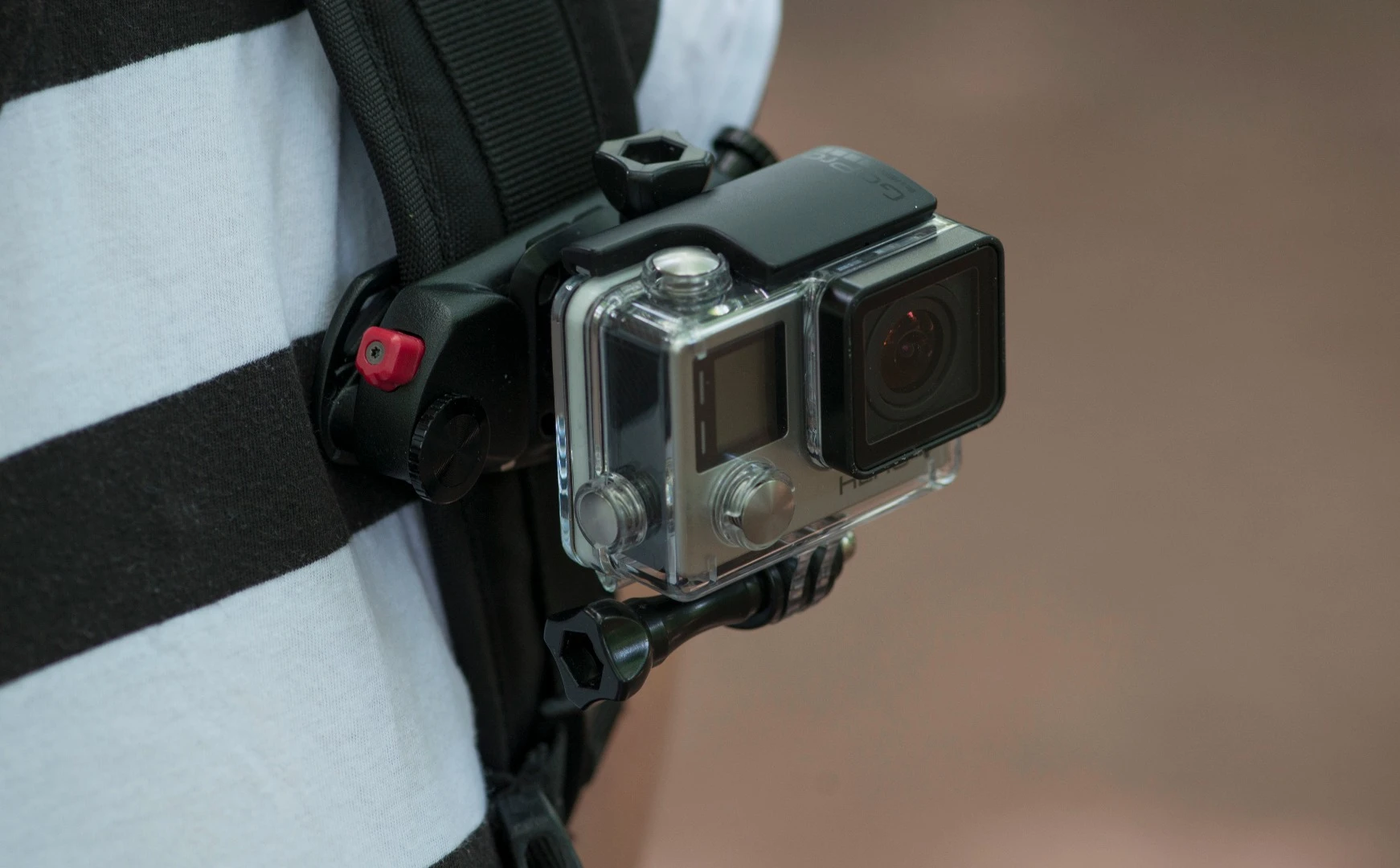 The Peak Design Capture clips allows users to wear a GoPro or other action camera on a backpack strap or belt