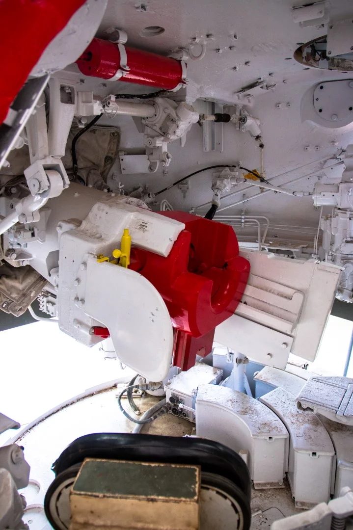 Inside the turret of the M60A3 Patton tank, looking at the loading chamber from the loader's seat. I can't even imagine how loud it must have been in there while firing as many as 10 shells per minute