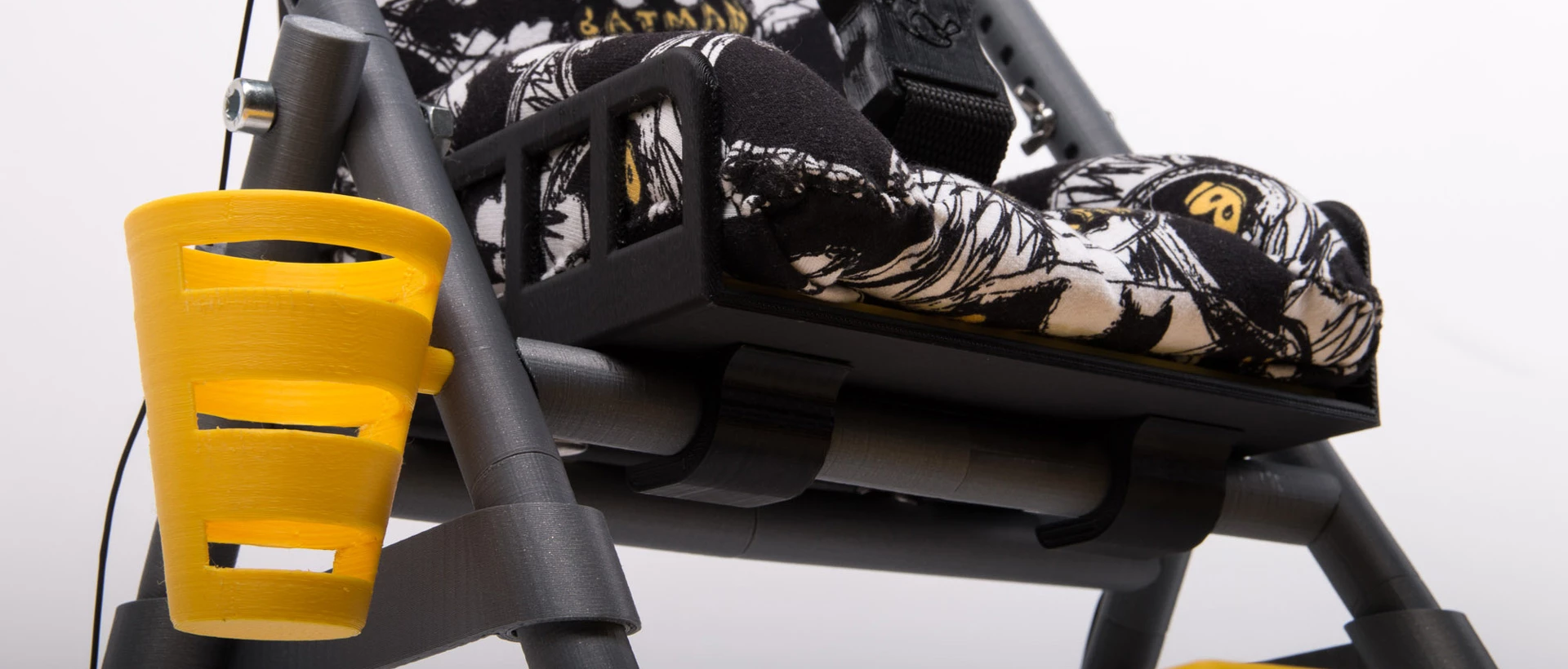 The multifunctional walker features switch-out shopping cart and baby seat add-ons