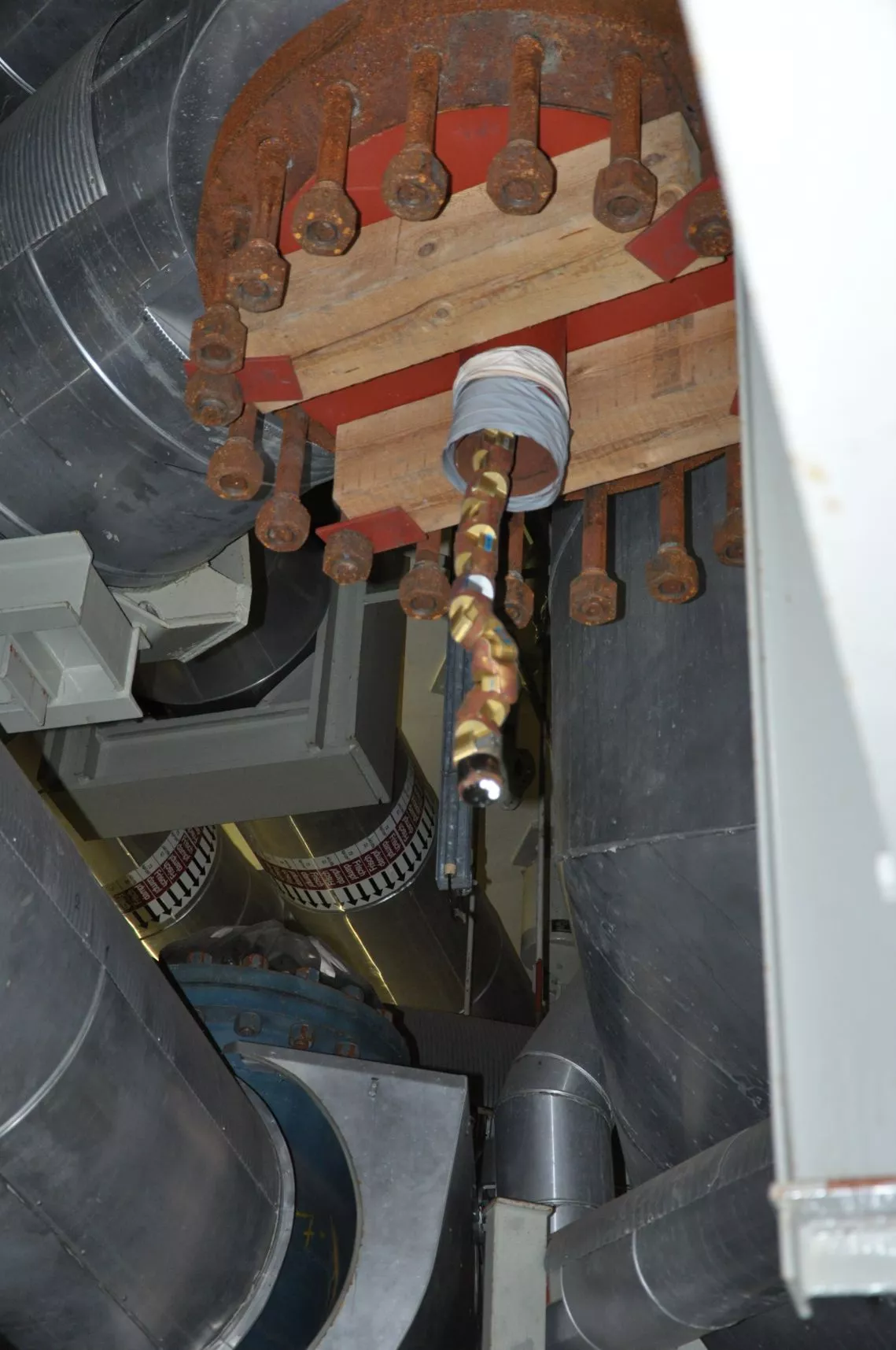 The modular snake robot peeks out of a pipe inside the Zwentendorf nuclear power plant