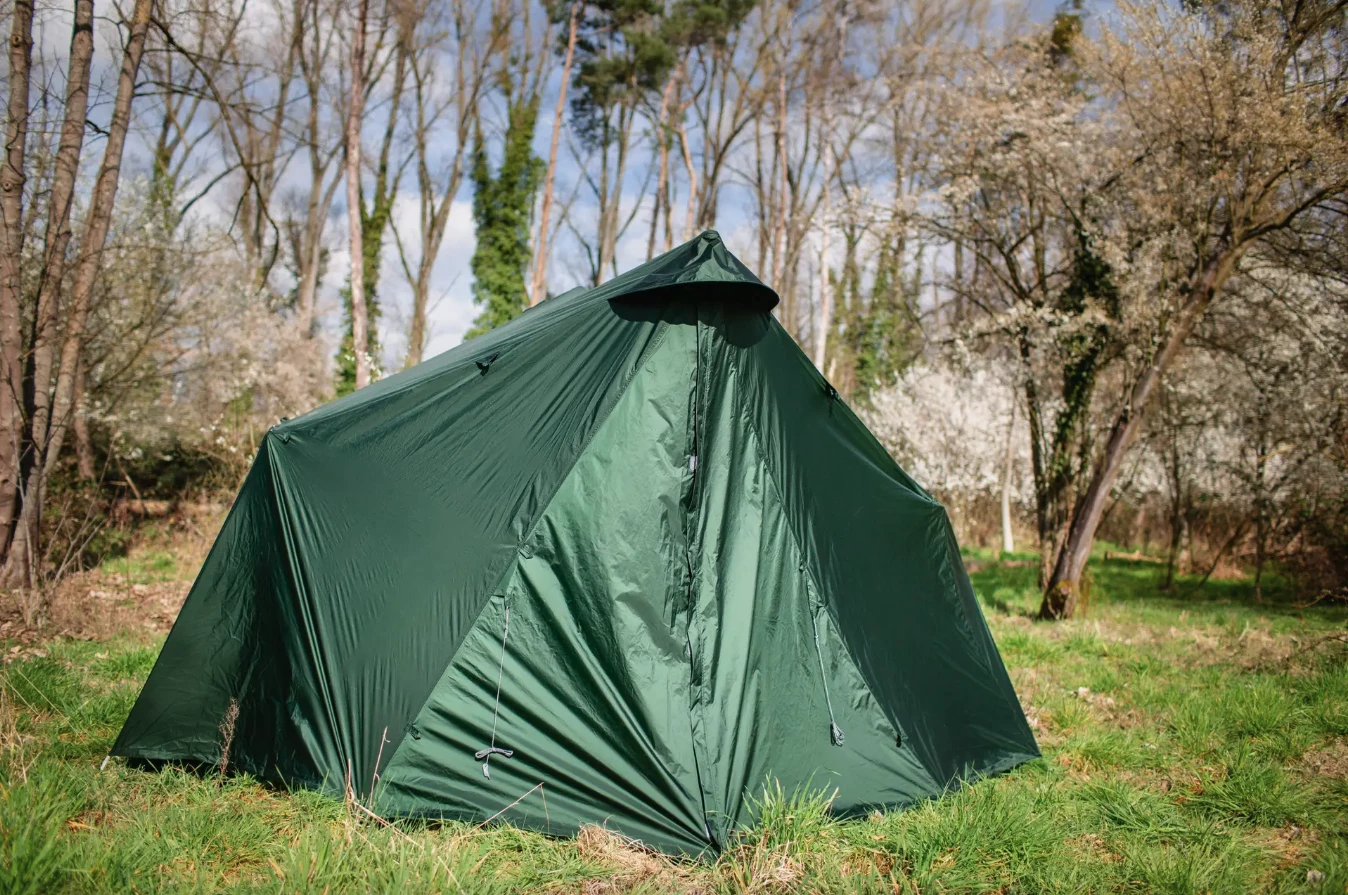 The tent on the original Spacecamper Bike concept left some serious open air between the fabric edge and ground, but the production version extends right to the ground