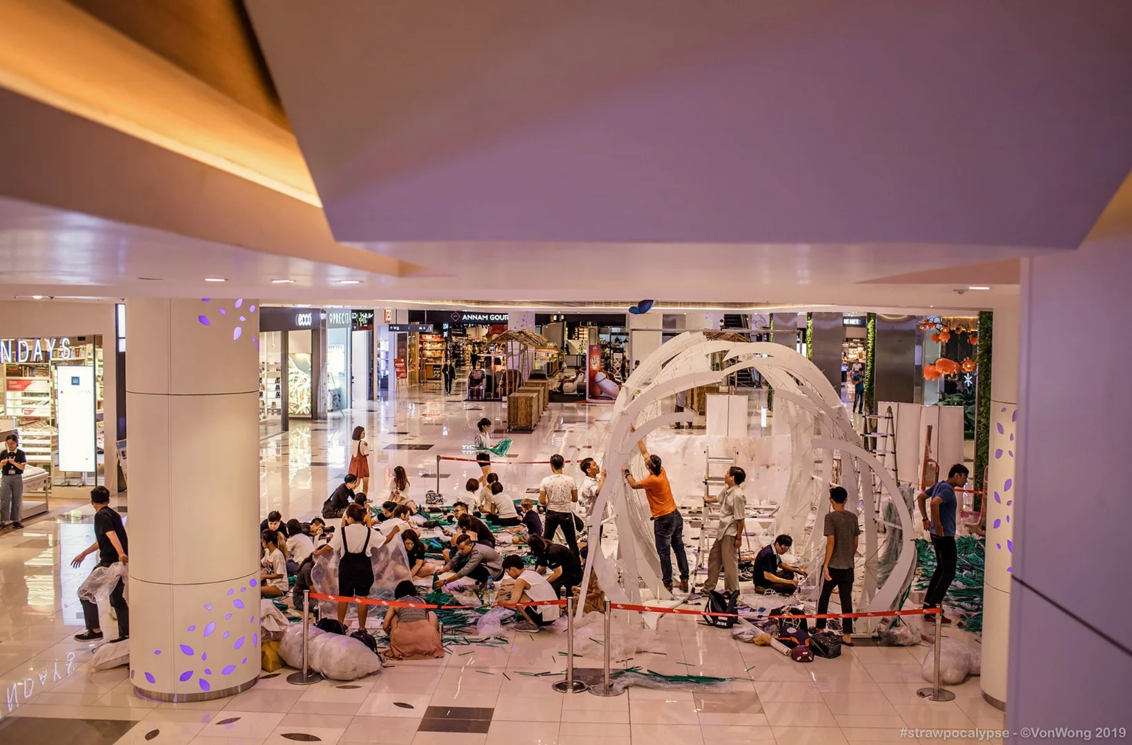 Volunteers during the construction of the Strawpocalypse installation