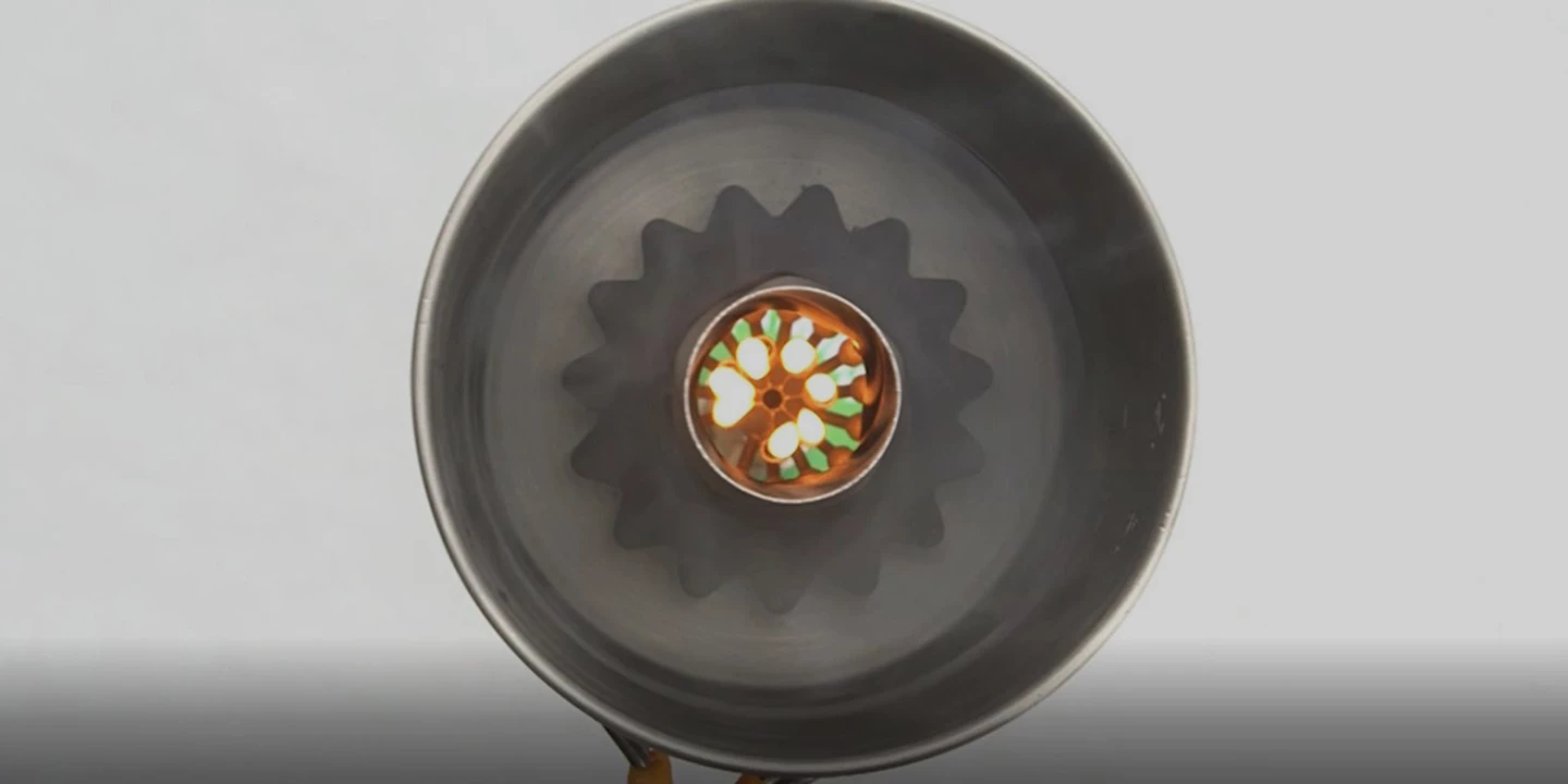 Looking down on the PeakBoil stove, immersed in a kettle full of water