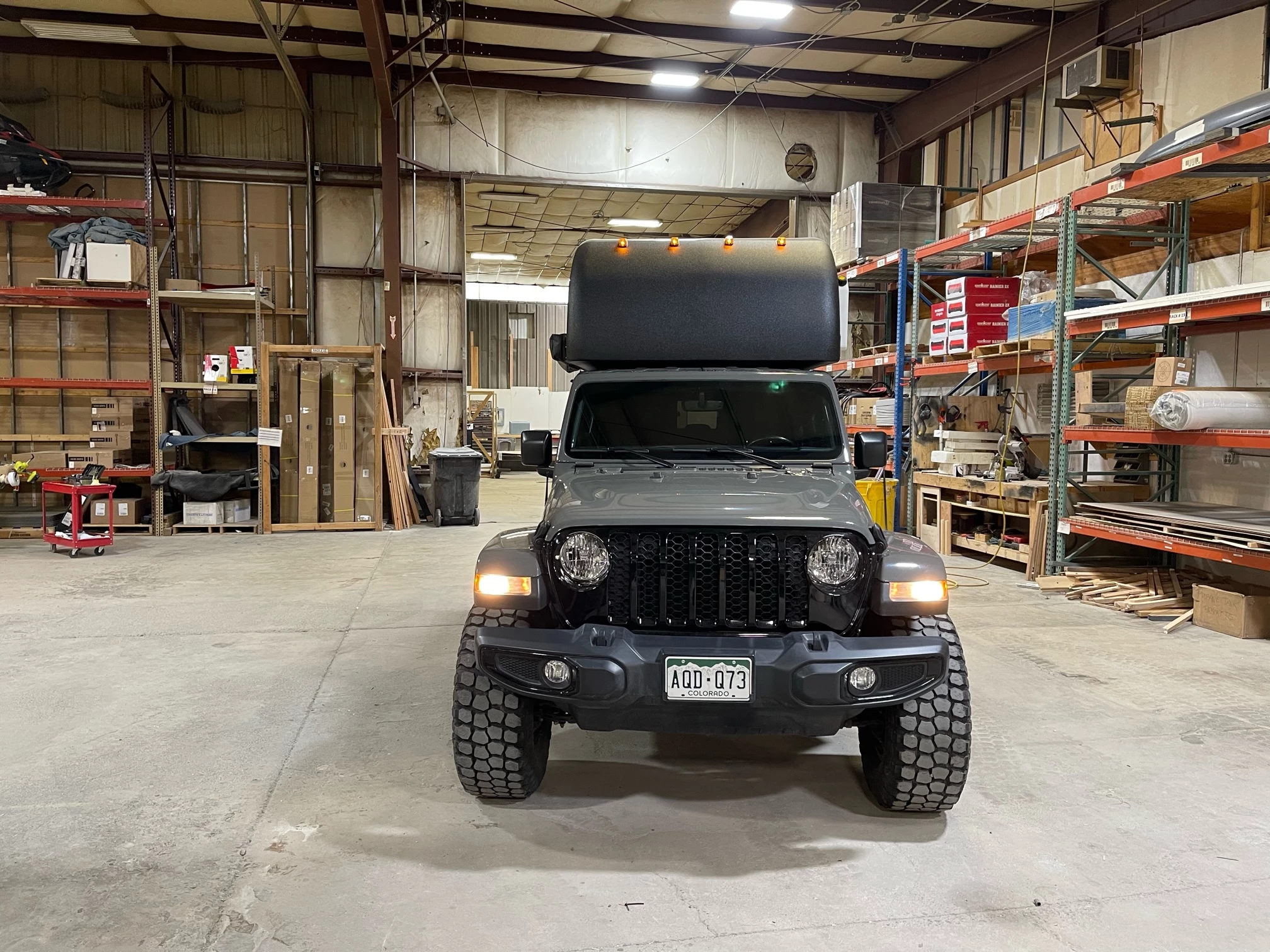 One disadvantage of the hard fixed roof is that it doesn't tuck down low for driving – High Altitude estimates a loss of 2-3 mpg