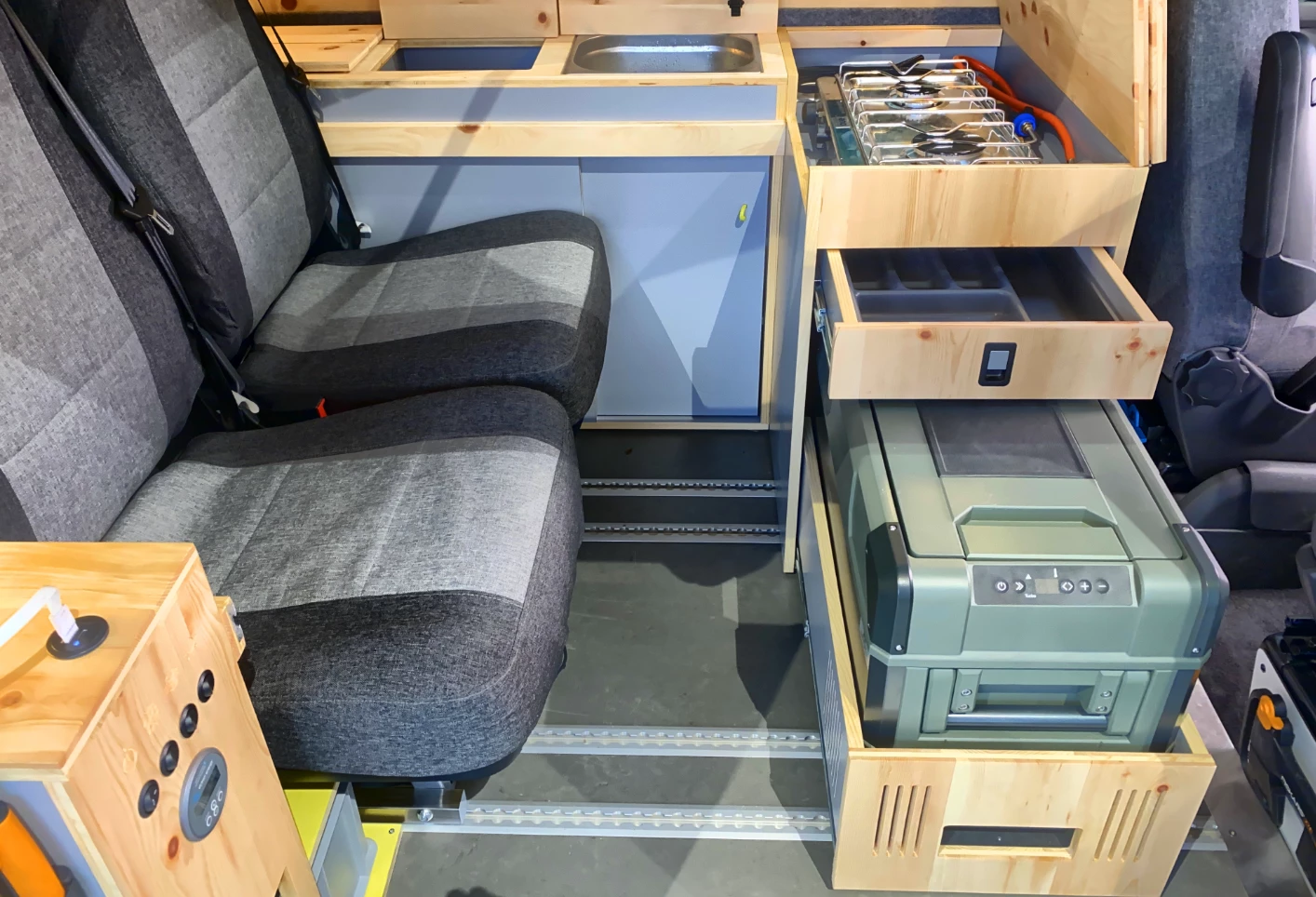 The L-shaped kitchen with slide-out utensil drawer and fridge tray