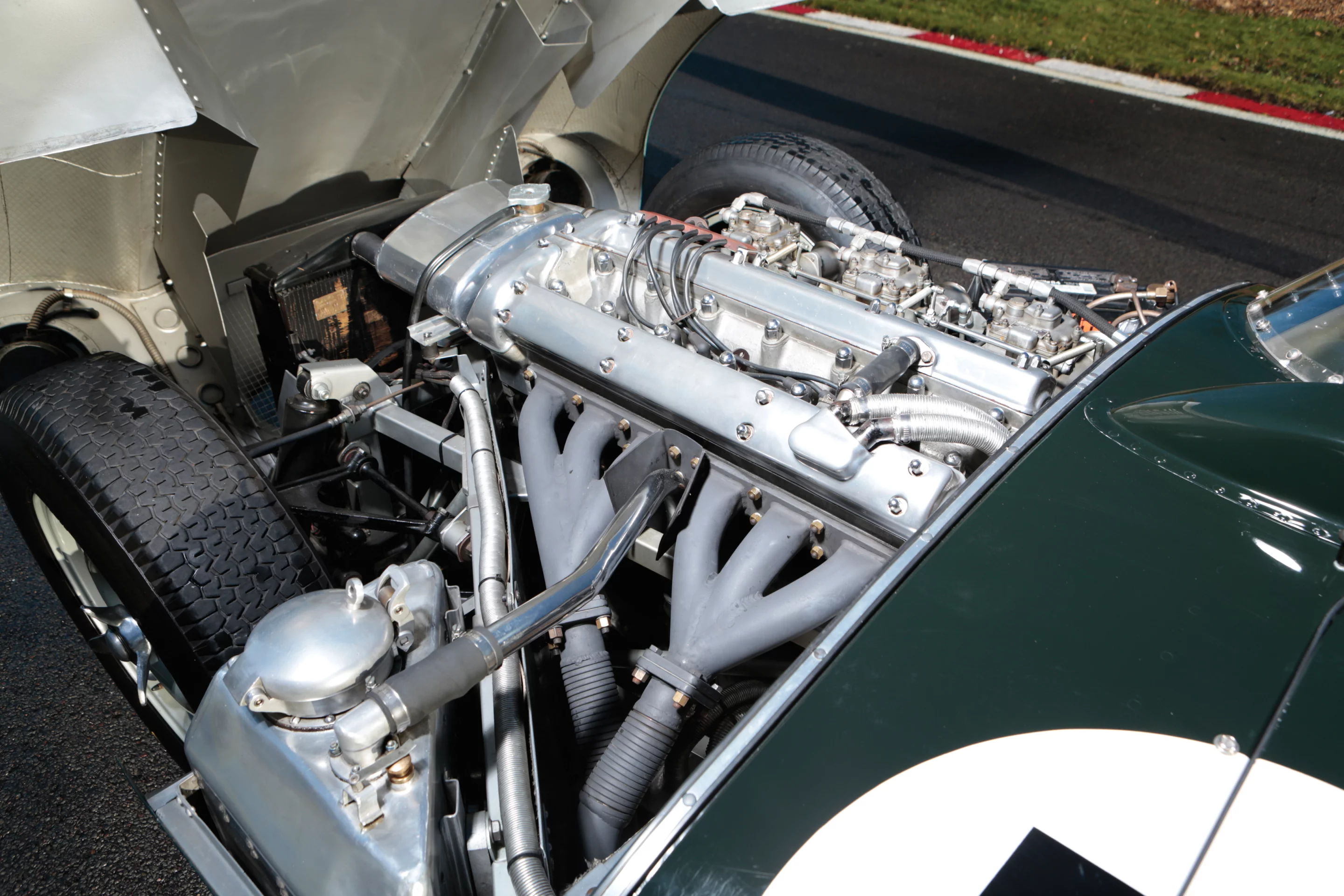 The seventh customer Jaguar D-Type produced, this highly original example was delivered new to Australia where it was campaigned by four-time Australian Drivers' Champion Bib Stillwell and subsequently owned by 1970 Le Mans winner Richard Attwood. The car was sold by RM Auctions in Paris in 2014 for EUR3,360,000 (US$4,996,248).