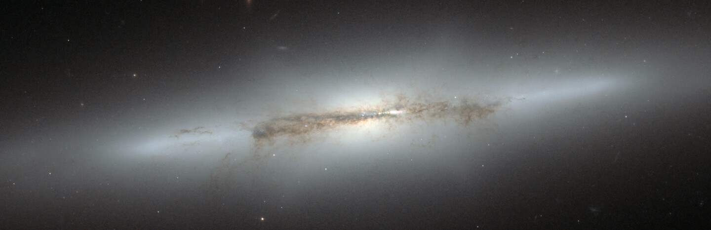 The NGC4710 galaxy as captured by the Hubble Space Telescope. The galaxy's core exhibits the same x-shape as that of the Milky Way (Image: NASA/ESA)
