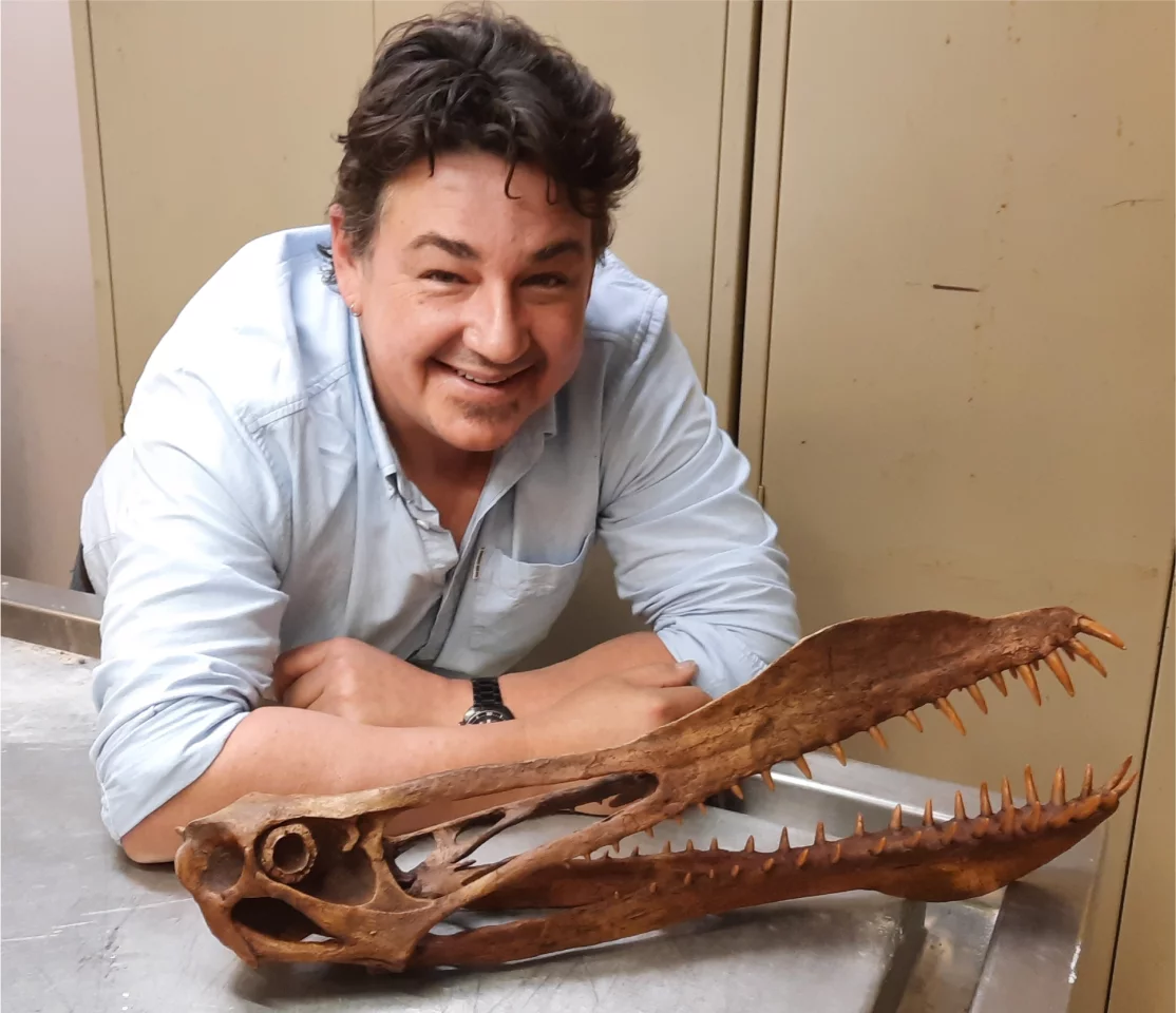 Lead researcher Tim Richards with the skull of a related pterosaur species