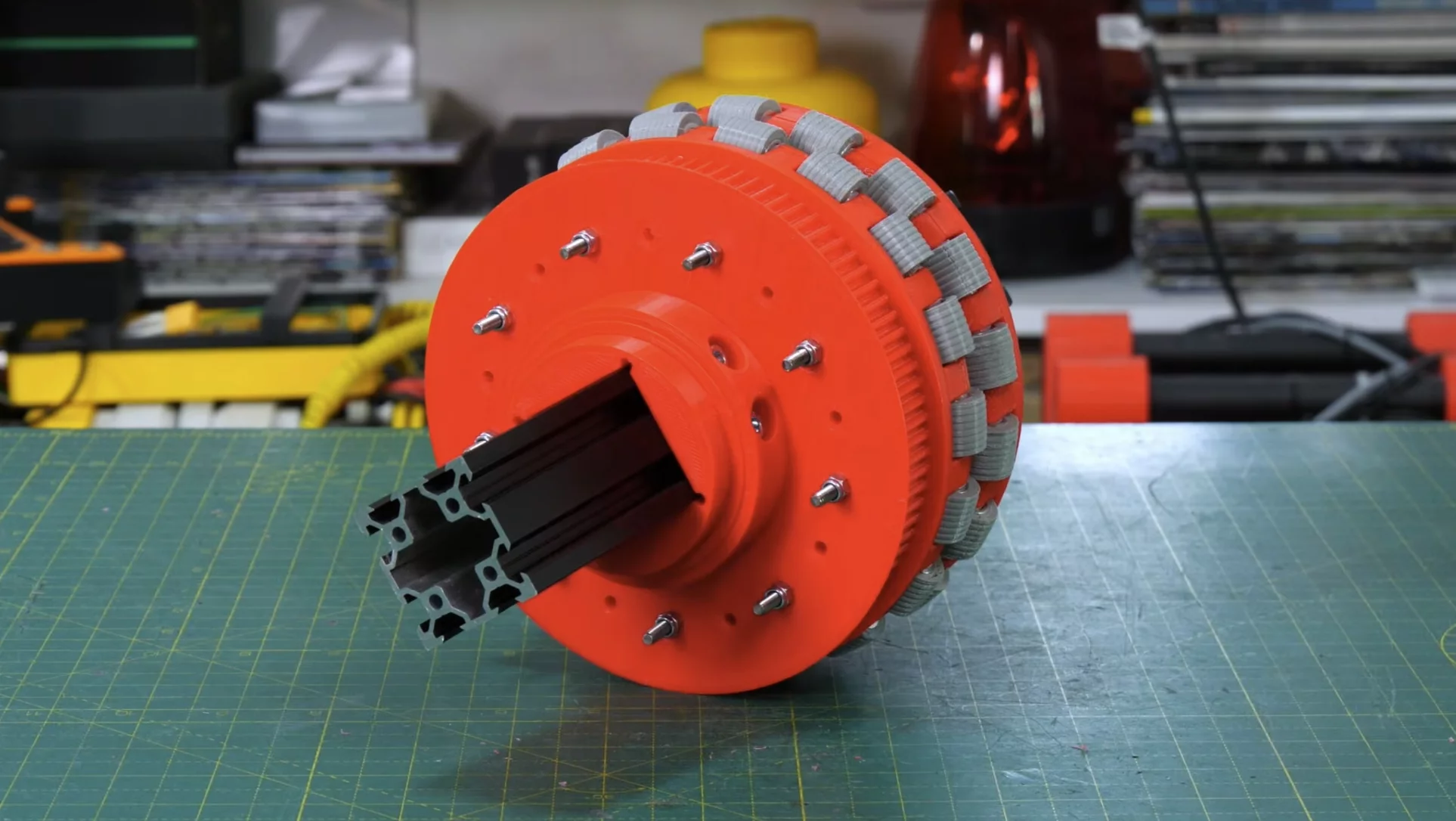 Each omni wheel has two rows of 18 smaller passive wheels mounted along its edges