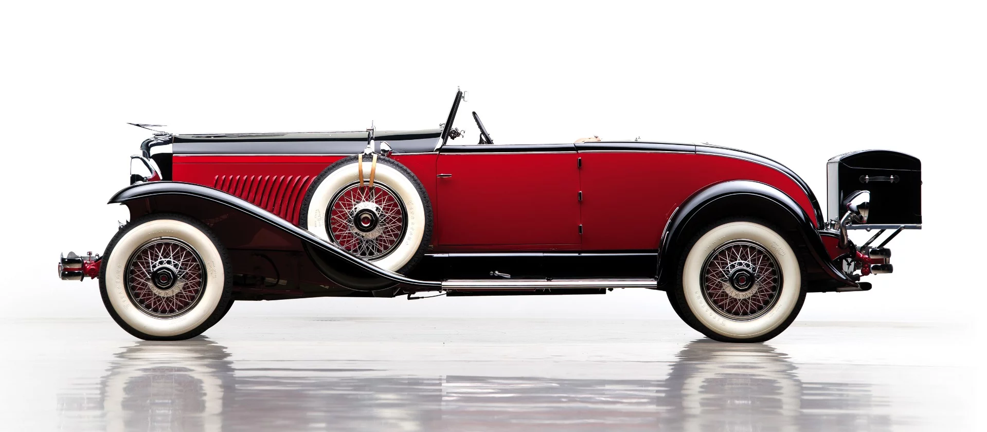 Lot 244 at the Andrews Collection sale is one of the (believed to be just 25) original Murphy-built "Disappearing Tops", the style that evolved from the original traditional tonneau covers to the flush-fitting metal lid which enabled the smooth elegant lines of the convertible to be retained when the top was down, running from the edges of the hood to the doors and down over the rear deck.<p></p><p><span>With reportedly $500,000 spent at the most recent restoration, this 1931 Duesenberg Model J still has its original </span>chassis, engine, and body and has won multiple awards.</p>