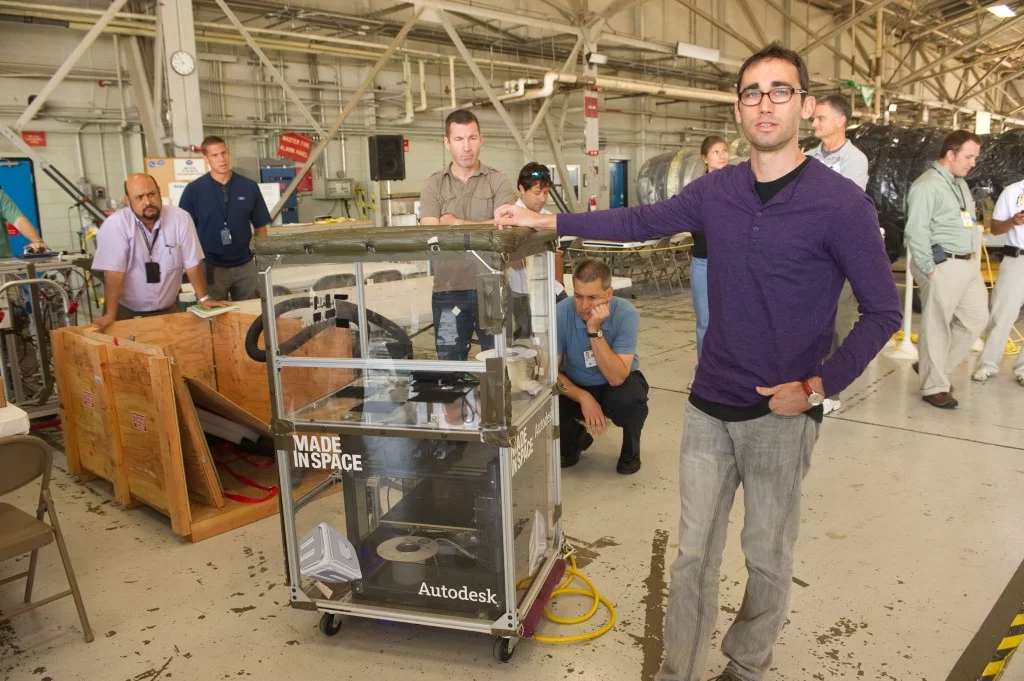 Made in Space CTO Jason Dunn displays a 3D Printing Test Experiment (Photo: Made in Space)