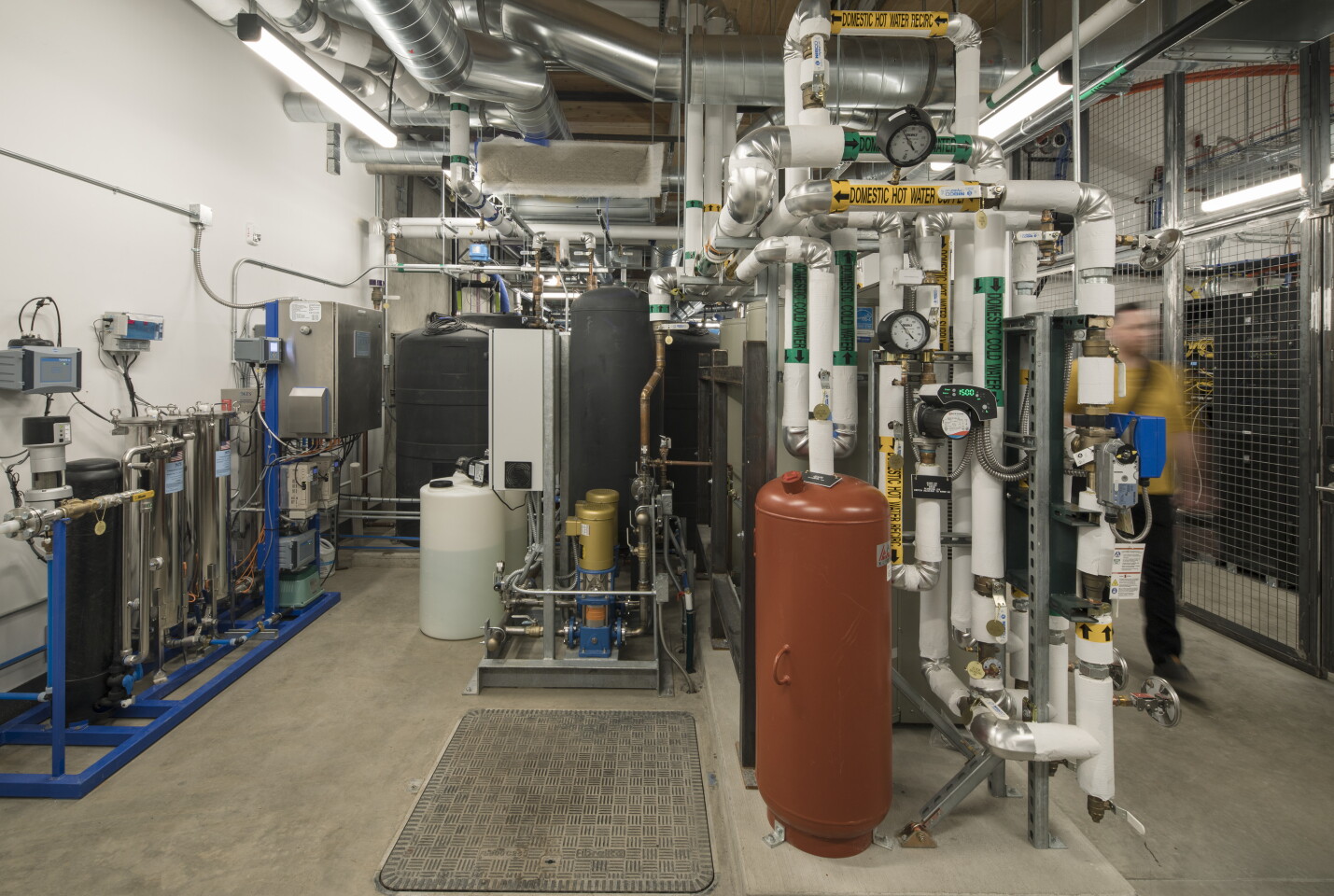 The water needs of the PAE Living Building are met using an onsite water capture and recycling system that includes cisterns to hold 62,500 gallons (approximately 237,000 liters) of rainwater.