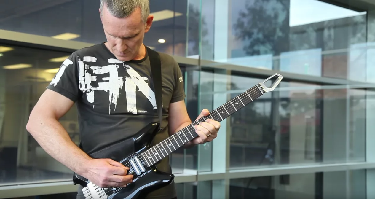 Designer Dave Auld plays the Fusion Guitar